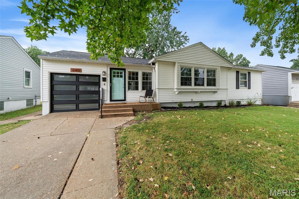 Open Sunday 9/27 1-3PM.  Imagine living just 15 minutes from everywhere you want to be in St. Louis. This beautifully updated home blends modern convenience with cozy charm. Step inside to find rich hardwood floors and a bright, open floor plan that flows effortlessly from room to room. The updated kitchen leads into a charming hardwood dining room, and the sun drenched living room is welcoming and the perfect spot to feel the sunshine as well as moody days.   The highlight is a clever, ceramic-tiled sunroom, perfect for morning coffee or reading. Two sizable bedrooms and a cute, updated bathroom with classy beadboard and tile round out the main floor.  There is also a naturally bright finished basement that gives you all the extra bonus square footage you need. Outside, your private, fenced backyard oasis awaits, complete with a covered patio ready for fire pit nights, Fall grilling, and holiday hosting. Located just minutes from the River Des Peres Greenway bike/running path and the Lansdowne MetroLink Station.