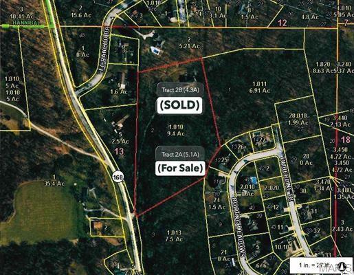 Private bluff property containing 5.1 wooded acres. Beautiful building site having secluded and peaceful country sitting with rural tranquility only minutes from town! Electric, gas, water, and sewer are all available. Access by shared drive.