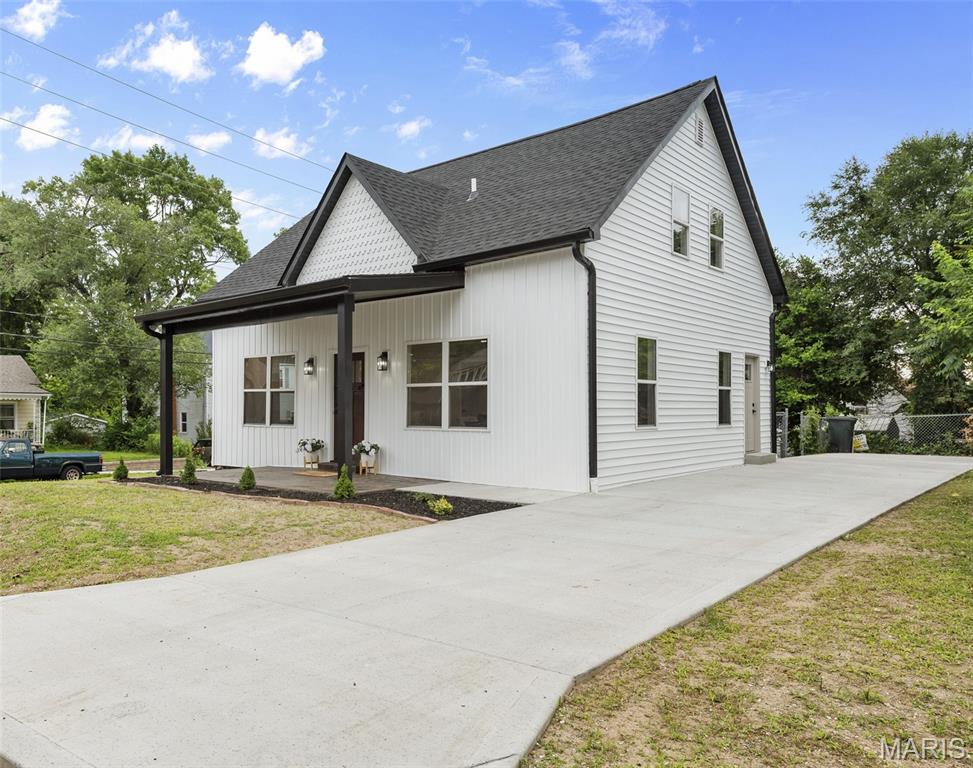 Take a look inside this gorgeous rejuvenated 3 bed & 2 bath home and you'll find it's much larger than it appears.  Over 1700 square feet of living space, and that does not include the unfinished basement. This 2 story home features a primary bedroom and adjacent full bathroom on the main level. The upper level offers 2 more generous sized bedrooms PLUS an impressive 3/4 bathroom. Both bathrooms have been totally updated w/ new vanities, lighted mirrors, modern fixtures and luxury ceramic tile. And check this out...You will never have to worry about the summer heat or winter cold on the upper level because this home is sporting a brand-new zoned HVAC system. 2 new central air units AND 2 new furnaces. The main level offers an open floor plan with new LVP flooring.  The living room flows gracefully into the dining room and around the corner to the open kitchen that's LOADED w/ new stainless appliances, granite counters, new cabinetry & shelves and a center island w/ breakfast bar. OOPs...Did I forget to mention the brand-new roof, siding and vinyl windows ? New water heater as well. 200 amp electrical. Fenced backyard. Other upgrades include the freshly poured concrete driveway and the new stained & stamped concrete front covered porch. Located just a short walk from all the shopping, restaurants and social establishments on Main Street in uptown Collinsville.  Less than 30 minutes from Scott AFB.