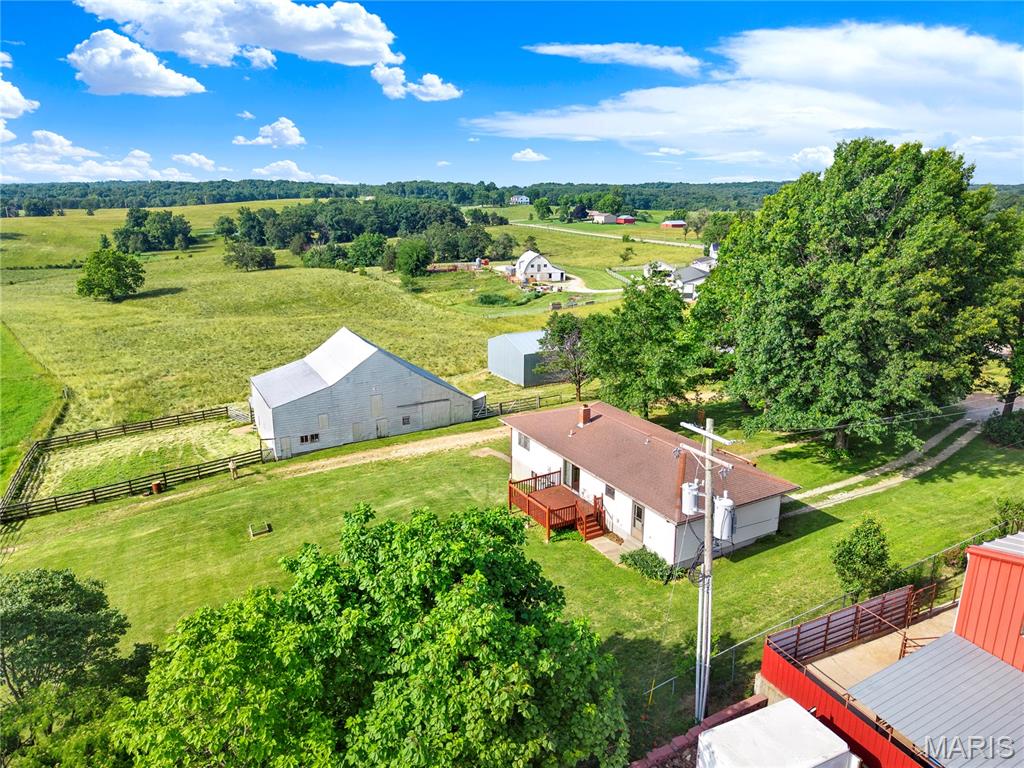 Discover the perfect blend of country living and natural beauty on this stunning 60-acre farm. Featuring breathtaking panoramic views, a picturesque lake, and a charming home with an established farmstead, this property offers endless opportunities for farming, recreation, or a private rural retreat.

The rolling acreage provides a beautiful mix of open land and scenic landscapes, while the lake creates a peaceful setting for fishing, wildlife watching, or simply enjoying the view. The well-maintained home offers comfort and convenience, complemented by farm buildings and infrastructure ready for livestock, crops, or hobby farming.

Whether you're seeking a working farm, a family homestead, or a countryside escape, this exceptional property delivers space, privacy, and unmatched natural beauty in one remarkable package.