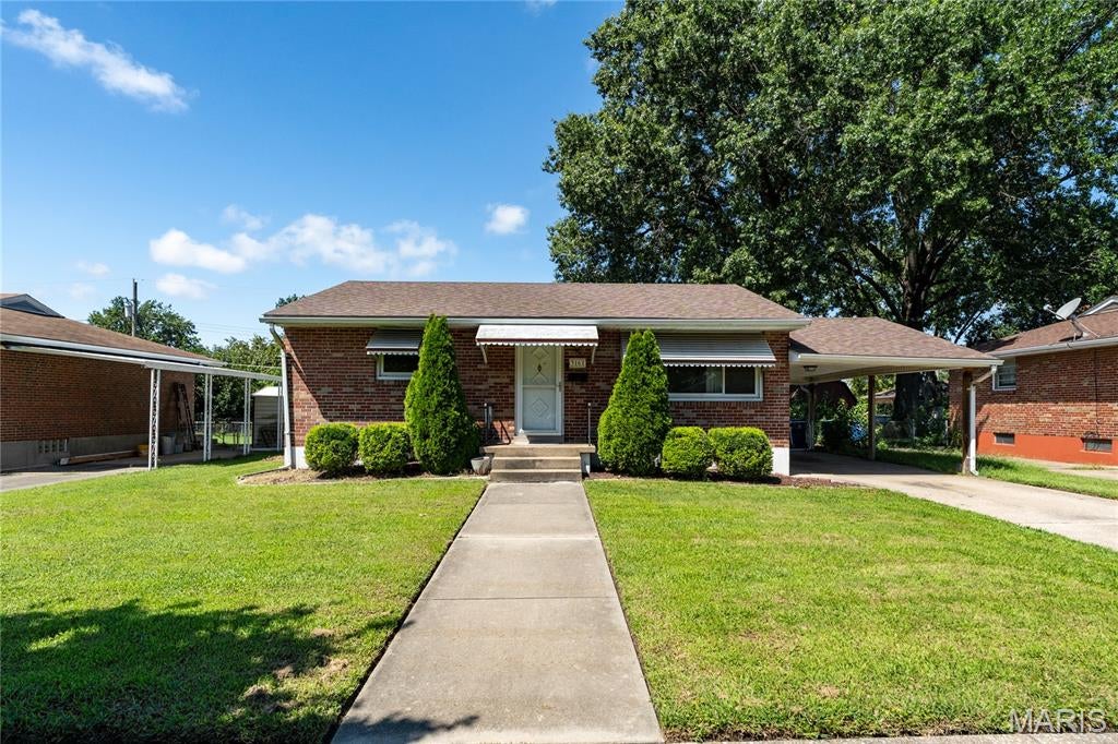 Welcome home to this charming all-brick 2-bedroom, 2-bath home located in a wonderful neighborhood! The main level features a very nice kitchen, spacious living room, two comfortable bedrooms, and a full bath.
The finished basement offers plenty of additional living space with a large recreation area, second bathroom, and two bonus rooms—perfect for a home office, hobby room, guest space, or additional storage. Outside, you’ll find a carport, large storage shed, nice backyard, and patio, providing a great space for relaxing or entertaining. Additional updates include HVAC in 2018 and a new sewer line in 2019. With its all-brick exterior, spacious layout, great basement space, and inviting backyard, this home is one you’ll definitely want to see!