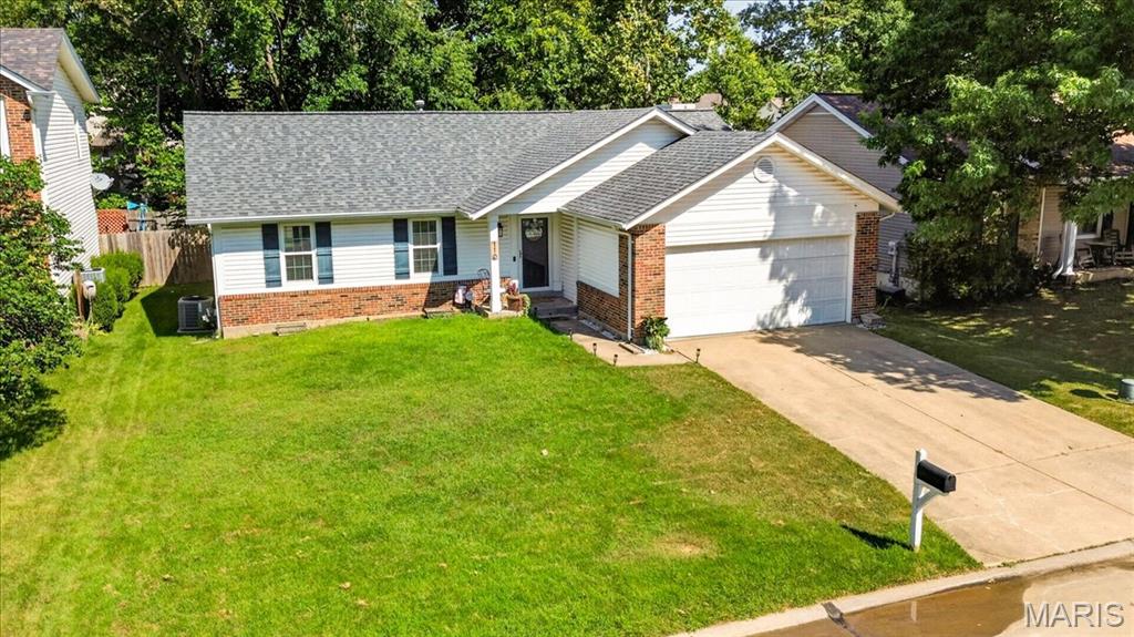 Welcome home to this beautifully updated ranch in sought-after Copperfield! This 3-bed, 3-bath home offers 2,282 sq ft of finished living space with an open, light-filled floor plan. The main level features a spacious great room with a cozy wood-burning fireplace, vaulted ceilings, and luxury vinyl plank flooring throughout. The remodeled kitchen shines with granite counters, stainless steel appliances, a breakfast bar, and a separate dining area — perfect for entertaining. The primary suite offers a private full bath, and two additional main-level bedrooms provide flexible space for family, guests, or a home office. The finished lower level is an entertainer's dream with a large recreation room, media room, 4th bedroom, and full bath — ideal for a teen suite, in-law space, or game-day headquarters. Enjoy the fenced, level backyard backing to a wooded area for added privacy, plus a storage shed and attached 2-car garage. Community pool included! Zoned for top-rated Ft. Zumwalt R-II schools. Minutes to shopping, dining, and highway access. Don't miss this move-in-ready gem in one of O'Fallon/St. Peters' most established neighborhoods!