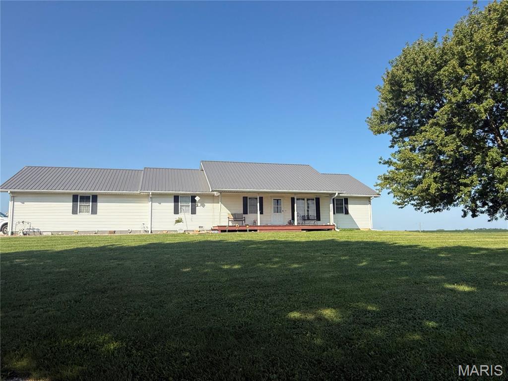 Nestled in the picturesque rolling hills of Glenwood, MO, this beautiful hobby farm spans 23 acres M/L and offers a serene lifestyle. Built in 1996, the charming home features 3 bedrooms and 2 bathrooms, complemented by a spacious two-car garage and a welcoming covered front porch—perfect for enjoying morning coffee or evening sunsets. Recent updates in 2024 include a new dishwasher, kitchen window, ceiling fans, and fresh paint throughout, enhancing its appeal. The property boasts significant farm improvements, including a brand-new 52 x 40 barn equipped with two-phase electric, an extension for lambing, and individual lambing pens. New waterlines with a frost-free hydrant, four waterers, and small livestock fencing enhance functionality. With 10 acres of improved pasture and 10 acres dedicated to hay ground, this well-maintained hobby farm offers panoramic views and the perfect setting for farming enthusiasts or those seeking a peaceful retreat.