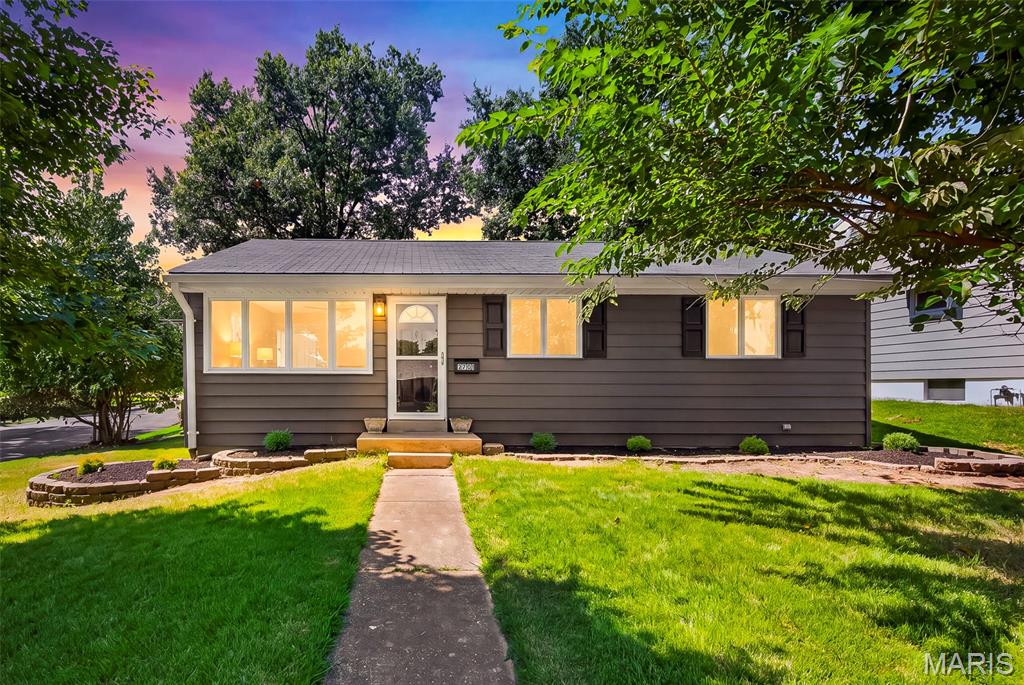 Welcome to this beautifully updated 3 bedroom, 2 full bath home offering 1,577 total sq. ft. and a classic Americana feel with thoughtful updates throughout. The light, bright and airy living spaces create a warm and inviting atmosphere that flows beautifully into the stunning kitchen featuring custom white cabinetry, gleaming quartz countertops, a stainless steel farmhouse sink and all new stainless steel appliances, all included. Both bathrooms have been fully renovated, while luxury vinyl flooring throughout the main level, fresh paint, new light fixtures, brand new AC and HVAC and updated electrical add comfort and peace of mind. The finished lower level offers a spacious recreation area, full bath and versatile bonus room with plenty of possibilities. The backyard is a standout feature, offering a fully fenced, flat and nicely sized yard with a covered patio that is perfect for relaxing, entertaining or enjoying time outdoors. A large backyard shed provides additional storage and stays with the home. You will also appreciate the huge oversized side entry 1 car garage with plenty of room for a vehicle, workshop or additional storage, along with a covered carport providing even more protected parking. Located in a quiet Midtown neighborhood just minutes from Historic Main Street, local shops, restaurants, parks and schools. Every update was thoughtfully chosen and completed with quality in mind. This is a home you can truly move into, enjoy and make your own.