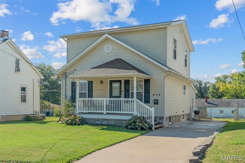 Excellent Location in Washington! Within walking distance of schools, shopping, restaurants, hospital, banks, Krog Park, and more, this well-maintained 5-bedroom, 2-bath home offers over 1,600 square feet of living space and plenty of room for a growing family.

The main level features a welcoming living room, an open kitchen with a separate dining area, and a large family room just off the kitchen that offers lots of space and versatility. Wood-look laminate flooring flows through the living room, dining room, and kitchen, creating a warm and inviting feel. The primary bedroom is conveniently located on the main level and includes a walk-in closet, with a full bathroom conveniently located nearby.

Upstairs, you'll find four additional bedrooms and a full bathroom, providing privacy and separation from the main living areas. The large basement provides plenty of storage space and flexibility to meet your needs.

Outside, enjoy a nice-sized, level lot with a chain-link fenced backyard, offering plenty of room for kids, pets, and entertaining, along with a large gazebo with a fire pit—a perfect spot for relaxing and enjoying evenings outdoors with family and friends.

With five bedrooms, two full baths, multiple living areas, a fenced backyard, and an excellent location, this home offers the space, convenience, and flexibility you've been looking for. Come check it out and see all this property has to offer!
