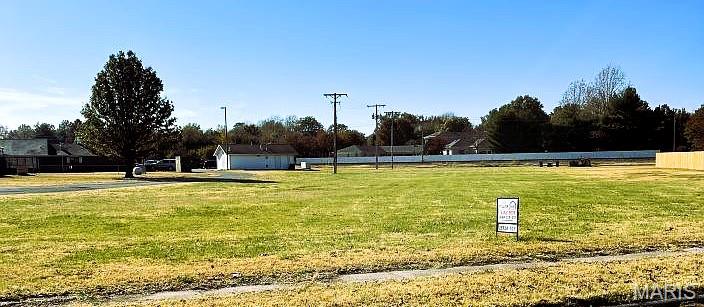Looking for a blank canvas to build your dream home? This lot is located in an established neighborhood in the charming and family-friendly north end area of Sikeston. Lot is 1.07 acres in size. Located 1 block north of Salcedo Rd. and across the street from the Sikeston Junior High. Houses must be a minimum of 2200sf collectively. A detached building can be built on the lot, but must match the finishes of the house. This lot currently has electric. If you are a developer looking for your next property to add to your portfolio or someone looking to build your first or next home, call SMG Realty.
