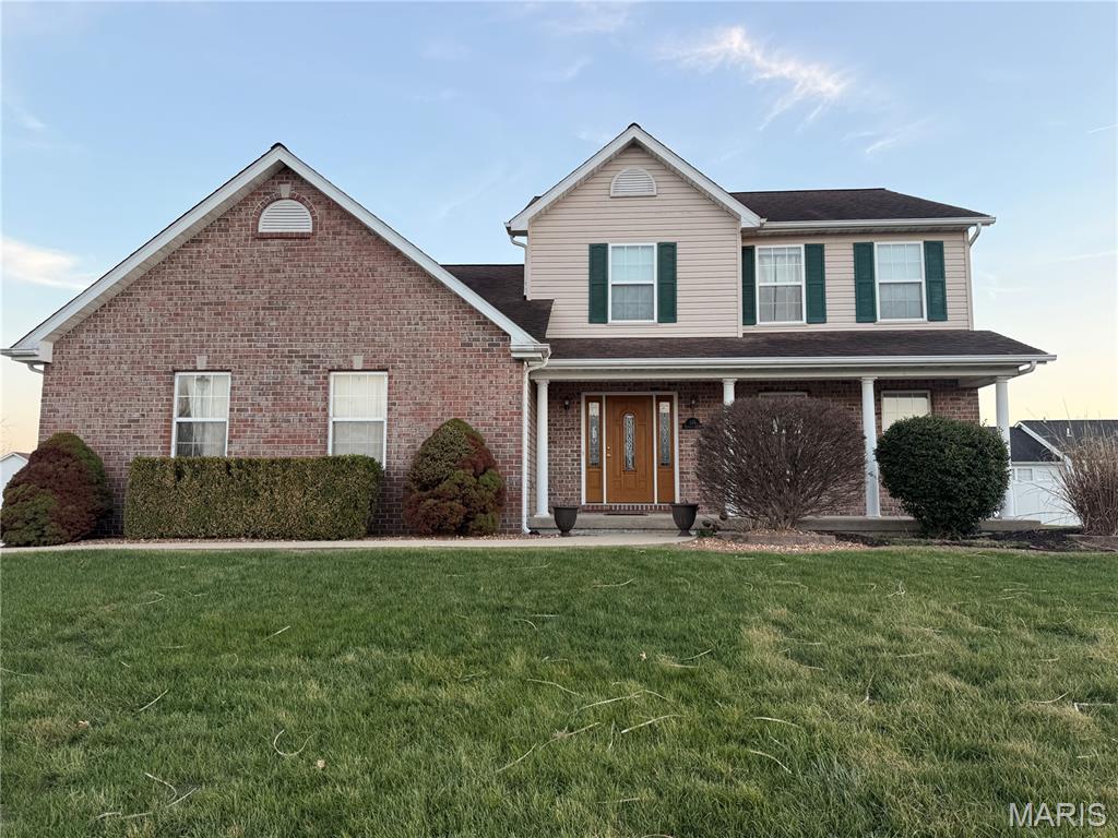 You’re going to love everything about this spacious, beautifully maintained two-story home in Patriots Crossing! Offering 3 bedrooms and 4 baths, this home provides the perfect balance of comfort, functionality, and room to grow.

The main level offers a warm and inviting layout, featuring a dining room with hardwood flooring, a bright kitchen with a charming breakfast nook, and a cozy living room centered around a gas fireplace. Just off the kitchen, step outside to a patio with a pergola—perfect for relaxing or entertaining. A convenient main floor laundry and half bath add to the home’s functionality, making it ideal for both everyday living and hosting guests.

Upstairs, you’ll find a generous primary suite, two additional bedrooms, and a full bath. The finished lower level expands your living space even further with a large family/rec room, full bath, and a versatile bonus area—perfect for a home office, craft room, or play space.

Situated on a desirable corner lot, the outdoor space is just as inviting—featuring a deck with pergola that’s perfect for relaxing evenings or entertaining guests. An attached two-car garage adds everyday convenience.

This home has been lovingly cared for and is truly move-in ready.

Recent updates include:
Garage door, countertops and sinks, new basement carpet (2026), fresh paint including cabinets (2025), Water heater (2023), HVAC (2022). Roof is approximately 12 years old.

With so much space, thoughtful updates, and a fantastic location, this is one you won’t want to miss—schedule your showing today!