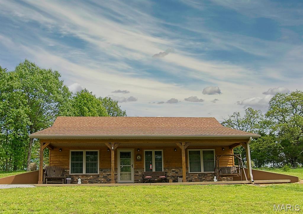 ?? Private Country Retreat on 41 Acres - Energy Efficient Earth Berm Home ?? Escape to your own secluded paradise with this unique 2 bedroom, 1 bathroom earth berm home nestled on 41 stunning acres. Designed for efficiency and comfort, this home offers low-cost heating and cooling year-round, making it as practical as it is peaceful. Step inside to find a cozy, functional layout featuring a spacious utility room and a built-in safe room for added security and peace of mind. The home's design embraces simplicity and durability, perfect for those looking to live efficiently without sacrificing comfort. Enjoy your mornings or unwind in the evenings on the front porch overlooking breathtaking views of rolling countryside. The property itself is a rare find--a perfect blend of wooded acreage and open pasture, ideal for hunting, livestock, or recreational use. A creek winds through the middle of the land, adding both beauty and usability to this already incredible setting. And best of all, the home offers true privacy, tucked away where it cannot be seen from the road. If you've been searching for a peaceful homestead, hunting retreat, or off-the-grid lifestyle opportunity--this one checks all the boxes. ? 2 Bed | 1 Bath ? Earth Berm (Energy Efficient) ? Safe Room ? Large Utility Room ? 41 Acres (Woods + Pasture) ? Creek Running Through Property ? Private, Secluded Setting ? 24 x 24 Shop Building ?? A rare opportunity to own a property that combines efficiency, privacy, and natural beauty.
