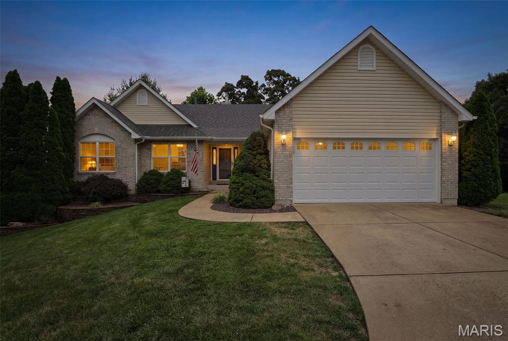 Welcome home to this beautifully updated 4-bedroom, 3-bath atrium ranch tucked away on a quiet cul-de-sac in the highly sought-after Windsor School District! From the moment you step inside, you'll be captivated by the vaulted ceilings, gleaming hardwood floors, cozy fireplace, and wall of windows showcasing breathtaking pond views. The spacious main level offers an ideal layout featuring an open family room, formal dining room, and an inviting eat-in kitchen complete with granite countertops, ample cabinetry, and direct access to the oversized deck, perfect for enjoying your morning coffee while overlooking the tranquil water. The private primary suite boasts a walk-in closet and full bath, while main-floor laundry adds everyday convenience. Downstairs, the finished walkout lower level offers endless possibilities with additional living space, bonus rooms, a full bathroom, abundant storage, and direct access to the expansive patio creating the ultimate indoor-outdoor entertaining experience. Step outside and discover your own private retreat featuring a peaceful backyard, oversized patio, and elevated deck overlooking the pond, making this home ideal for relaxing, hosting guests, or simply enjoying nature. Additional highlights include an oversized 2-car garage, extended driveway with plenty of parking, and a prime location just minutes from major highways, shopping, dining, and everyday conveniences. Homes offering this combination of space, updates, views, and location rarely come available so don't miss your opportunity to make 5158 Georgine Drive your forever home!