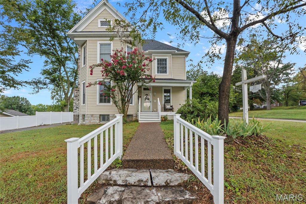 Step into more than a century of character without sacrificing modern comfort. Built in 1904 and beautifully updated throughout, this 4 bedroom, 3 bathroom home in the heart of downtown Jackson combines the craftsmanship and charm of a historic home with extensive improvements inside and out.
Original hardwood floors have been newly refinished, highlighting the gorgeous woodwork and architectural details found throughout the home. The spacious updated kitchen features new appliances along with the original farmhouse sink, preserving a piece of the home's history while offering modern functionality. Updated bathrooms and fresh paint make the home feel bright, polished, and move in ready.

The impressive primary suite is a true retreat with a walk in closet, beautifully updated bathroom with walk in shower, and the convenience of its own laundry closet.

Outside, a classic wraparound porch adds to the home's incredible curb appeal, while the large lot offers plenty of outdoor space along with a carport and gazebo.

And the updates go far beyond what you can see. The home has updated plumbing and electrical, a tankless water heater, well maintained HVAC with additional mini splits upstairs, new windows throughout, reconstructed porches, new siding and gutters, and new roofs on the home, carport, and gazebo. Steel columns have also been added in the basement for structural reinforcement.

Beautifully maintained and thoughtfully improved, this home offers the best of both worlds: the craftsmanship, history, and personality of a 1904 home with the major updates today's buyers are looking for, all in a fantastic downtown Jackson location.