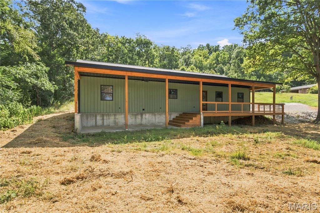 This brand new construction home is must see!! Check out this brand new 3 bed 2 bath home just outside of Doniphan sitting on over 1 acre surveyed and marked with a beautiful 10x60 deck off the front! The home features a 1 car garage and beautiful finish work and custom touches that you won't find in most homes from wood shelves, barn door and brand new kitchen appliances! The big open living/ kitchen combo makes it so spacious and the walk through master bathroom/ walk in closet is sure to impress!! This one won't last long so setup your showing today!