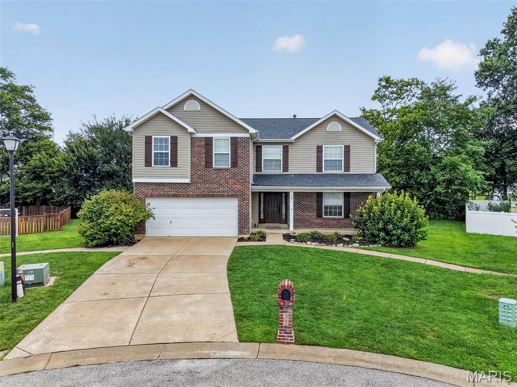 Welcome to this spacious former model home offering the perfect blend of style, functionality, and room to grow. This well-designed two-story home features 3 bedrooms, 2.5 bathrooms, and an inviting floor plan ideal for everyday living and entertaining. The main level offers a bright and open living space, convenient main-floor laundry, and a half bath for guests. The attached 2-car garage provides ample storage and easy access. Upstairs, you'll find three comfortable bedrooms, including the primary suite, along with a versatile bonus room that's perfect for a playroom, media room, home gym, or additional living space. The partially finished basement expands your living options with a dedicated office, theater room, and additional unfinished space for storage or future customization. Outside, enjoy a partially fenced backyard with plenty of space for outdoor activities, gardening, or relaxing. As a previous model home, this property showcases thoughtful design, quality finishes, and extra features throughout. With flexible living spaces, a desirable layout, and room for everyone, this home is ready for its next owners to make it their own. Seller is offering a 1 year home warranty plan.