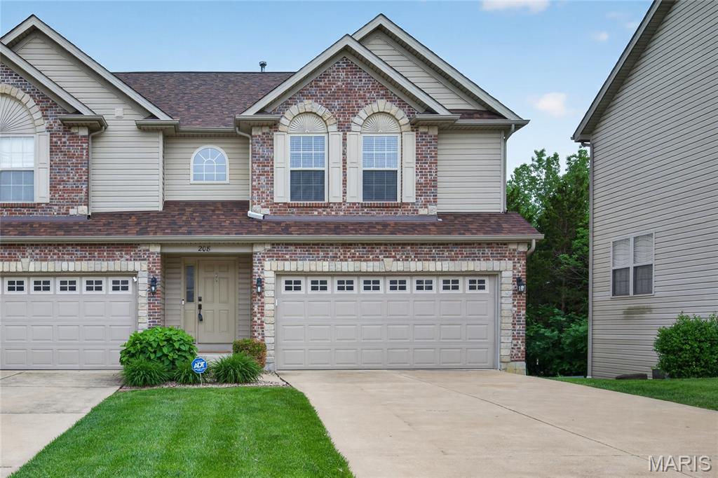 3 bedroom, 2.5 bath, townhome in an outstanding Lake St. Louis location! Offering 1,624 sq ft of finished living space, this townhome sits on a cul de sac, has an attached 2 car garage, walk out basement, 2 story Entry Foyer, convenient second floor laundry with washer and dryer included, and a deck and patio overlooking tree filled common ground. The exterior is timeless with brick, stone accents, vinyl siding, architectural shingles (New Roof in March 2026), enclosed fascia/soffits, garage coach lights, lawn irrigation and landscaping. The main floor has a Living/Family Room, gas fireplace with marble surround, Kitchen, Dining area, Powder Room and features luxury vinyl plank flooring. The carpet and luxury vinyl plank flooring were replaced in 2024.  The kitchen has white cabinets, a smooth top electric range, microwave, stainless steel dishwasher, refrigerator and pantry. The upstairs features a Primary Bedroom suite with a walk-in closet, Primary Bath, laundry room, a secondary bath and two secondary bedrooms, one with a walk-in closet. This community has easy access to Highways 40/61, 364 and 70. Students will attend desirable Wentzville Schools.  A monthly fee pays for lawn and landscape maintenance, lawn irrigation, some insurance, trash, roof maintenance and more. Excellent living space, a private lot backing to tree filled common ground and an amazing location, check it out!