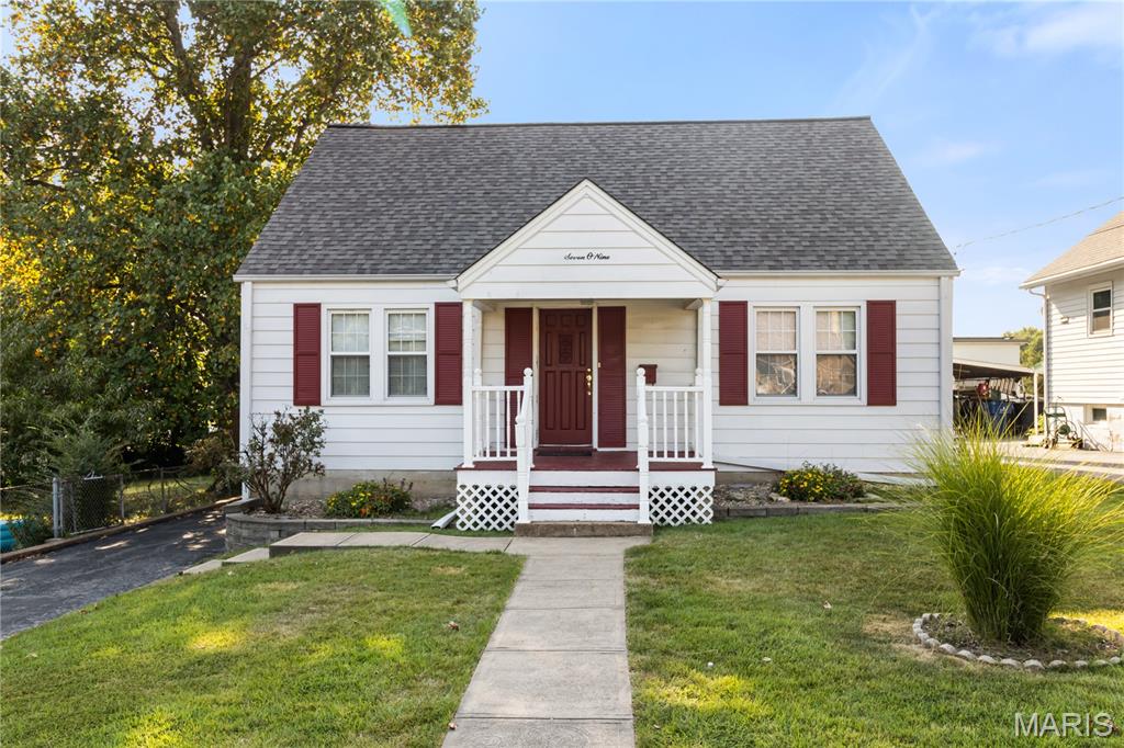 Welcome to this spacious & charming home in the heart of Festus, where character, comfort, and convenience come together! Boasting beautiful hardwood floors throughout, newer roof & windows, this home is warm and inviting feel with generously sized rooms and timeless details.
The kitchen offers ample cabinet and counter space, along with a convenient peninsula—perfect for meal prep, casual dining, or entertaining. The oversized family room is sure to be a favorite gathering space, featuring a cozy wood-burning fireplace and plenty of room to relax. The main-level primary bedroom features double closets. Separate dining & spacious living room complete the main level.
Two additional bedrooms are located upstairs. Along with a partially finished basement that provides endless potential to create whatever additional space you need—home office, recreation room, hobby area, or more. Abundant storage & ample closets throughout adds to the home's functionality.
Outside enjoy a large, level, fenced backyard offering plenty of room for entertaining, gardening, pets, or simply enjoying the outdoors. Detached garage and carport for added convenience. Situated in a peaceful neighborhood while remaining close to everything Festus has to offer, this home combines space, charm, and an ideal location.
Comes complete with a 1 year Choice Home Warranty for added peace of mind. With its spacious layout, classic character, and endless potential, this Festus gem is ready for you to make it your own!