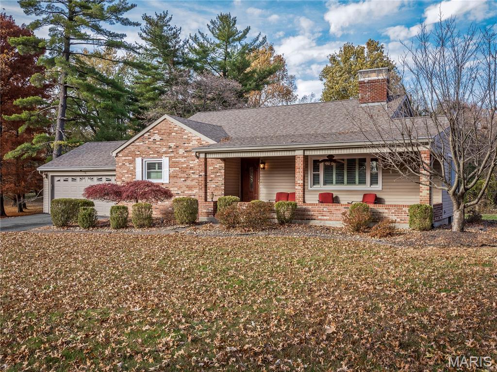 SHOWINGS WILL START ON FRIDAY,  3/27. 
 
Charming home nestled on just shy of a 1 ACRE LOT near Pine Lake with Lake Privileges! From the moment you pull in the driveway you will love the 6 x 29 covered front porch with brick floor. Inside, a welcoming foyer opens to a spacious living room featuring beautiful wood floors, fireplace and plantation shutters. The large dine-in kitchen offers a dishwasher, plenty of space for gatherings and includes a pantry for extra storage. PHOTO OF UPDATED KITCHEN IS VIRTUALLY REMODELED TO GIVE IDEA'S FOR KITCHEN REMODEL! Two very generously sized main floor bedrooms, one with wood floors (14 x 17) and the other brand new carpet (30 x 20) both offer ample close space. Hall bath with new vanity and flooring. Upstairs you will find a 3rd bedroom with built-ins, new carpet and great closet space with its own full bath - ideal for primary suite, guest space, or home office. Zoned heating and cooling for comfort on both levels. Basement is mostly unfinished with a brick fireplace (seller has not used and won't warranty) and provides great storage space and separate workshop area and a walk out door to back yard. Complete with a 2-car attached garage. Washer/Dryer and refrigerator in basement will stay. Freshly painted throughout! This home offers a peaceful country feel while still being just a new minutes to shopping, dining, and interstates. Owner and guests have lake privilege. HOA is $200/year and covers lake and common area maintenance. Roof 2019. Seller will look at all and any offers on Sunday, and will respond by Monday 3/30 at noon.  Seller will not respond to ANY offer prior to Sunday evening on 3/29! 
Passed Collinsville Occupancy.
