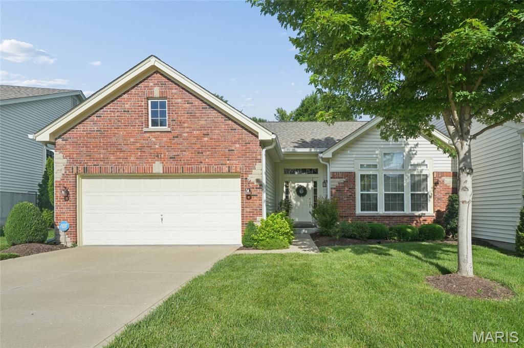 This wonderful ranch-style villa in the heart of Chesterfield offers the perfect blend of comfort and convenience! Featuring an open floor plan, the spacious layout includes three bedrooms, three full bathrooms and a finished lower level. The entryway opens to an inviting great room with a vaulted ceiling, gas fireplace and a separate dining room. Cooking is a delight in the beautifully updated kitchen featuring granite countertops, pull-out cabinet drawers, soft-close cabinets and drawers, a gas range and a built-in microwave. Enjoy your morning coffee from the comfort of the three-season enclosed deck while taking in views of the greenery. The main level also features a primary suite with vaulted ceiling, bay window, walk-in closet and bath with separate tub/shower, dual sinks and tile floor. The updated hall bath is perfectly situated next to the second bedroom for your guests. The finished lower level, complete with a spacious third bedroom and updated full bath, offers a versatile living space perfect for a recreation area, home office or guest retreat. The additional unfinished area provides plenty of room for your storage needs. Main-floor laundry and a two-car garage round out the functional floor plan. In a 24-hour gated community and ideally located near shopping and dining, don't miss the opportunity to enjoy the effortless living this villa has to offer!