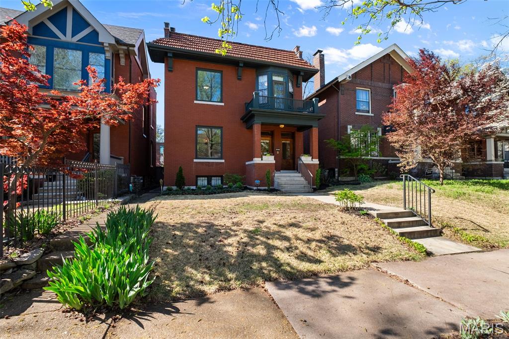 OPEN HOUSE Sunday, April 12, 1-3pm!  Magnificently maintained - 2 story 5 bedroom / 3 full bath in the elegant Skinker-DeBaliviere neighborhood.  This handsome red-brick classic St. Louis home has been lovingly kept through many years and is now available for its new owners!  Front porch with original tile and front doors is a welcoming place to chat with your neighbors & friends.  Entry foyer highlights the classic woodwork and stairwell and gives space to unwind as you greet your guests.  Main floor boasts hardwood flooring, towering ceilings, and spacious rooms to adorn with your personal furniture and artworks.  Front living room with gas fireplace flows nicely into the center dining room, a great combination for entertaining your guests.  The HUGE kitchen with newly installed quartz countertops, walk-in pantry storage area and abundant natural lighting; stands proudly as the heart of this stately gem.  Large breakfast room adjacent to kitchen at back of the home is truly a rare find.  Front & back stairwells offer easy navigation for your day-to-day household tasks.  First floor full bathroom provides ideal function if you choose to use the first floor study as a bedroom.  Second floor with newly installed white-oak flooring throughout offers 4 more bedrooms and 2 full bathrooms.  The stunning primary en-suite boasts an adjacent closet room with its own laundry (Washer & Dryer included) and built-in casements / shelving, another rare find with this age of home.  Full primary bath offers heated tile flooring and classic finishes.  The manicured lawn with carefully curated garden beds & fountain in back is a great setting to unwind after a long day.  Oversized brick garage provides secure parking for 2 vehicles, while still allowing ample space for a gardening or work bench plus storage for bicycles, lawn equipment, etc.  Friendly neighbors all around on this one of a kind block.  Unfinished lower level with tall ceilings offers a second full laundry setup plus mop sink (washer & dryer included), giving tons of additional storage and utility / work shop space.  Super convenient access with walkability to Forest Park, Kayak Coffee, Washington University, The Pageant, and dozens of other local dining and entertaining options along "The Loop".  Don't click that "Contact Agent" link.  Call today to schedule your very own fun and informative tour!