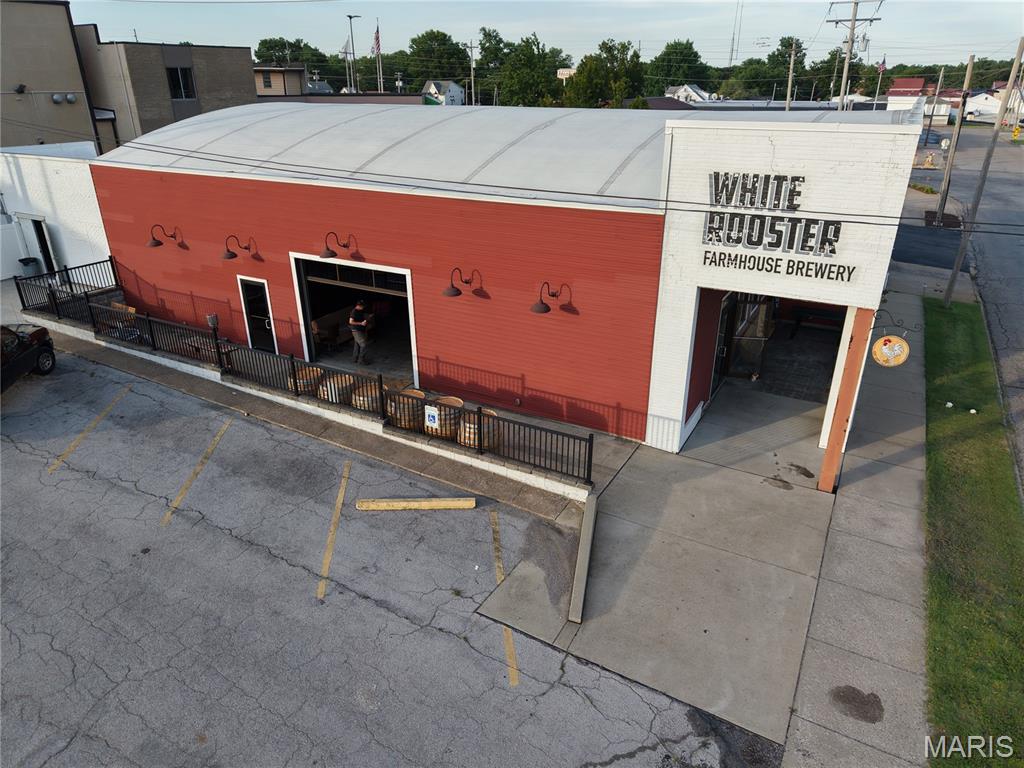 Prime Commercial Opportunity in the Heart of Sparta, Illinois!
Located in a high-visibility area in the heart of Sparta, this beautifully restored commercial building offers approximately 6,050 square feet (per county records) and an incredible opportunity for a variety of business ventures.
Originally built around 1950, the property underwent a major restoration in 2016 when it was transformed into a microbrewery. Today, it features an inviting open floor plan with polished concrete floors that showcase the building's impressive barrel ceiling, blending historic character with modern industrial appeal.
One of this property's standout features is the approximately 31 off-street parking spaces—a rare and valuable amenity for a downtown Sparta location, providing convenience for customers, employees, or event guests.
The flexible layout offers endless possibilities. Whether you're envisioning a restaurant, brewery, taproom, event venue, retail space, office headquarters, fitness studio, entertainment venue, another commercial use, or industrial, the open design can be adapted to fit your vision.
Property Highlights:
Approximately 6,050 sq. ft. on .51 acre lot (county records) 
Estimated 1950 construction
Extensively restored in 2016
Open floor plan with exposed barrel ceiling
Polished concrete floors
Approximately 31 off-street parking spaces
Prime downtown Sparta location
Excellent opportunity for owner-users or investors
Bring your business idea to one of Sparta's most recognizable commercial buildings and make this exceptional space your own.
