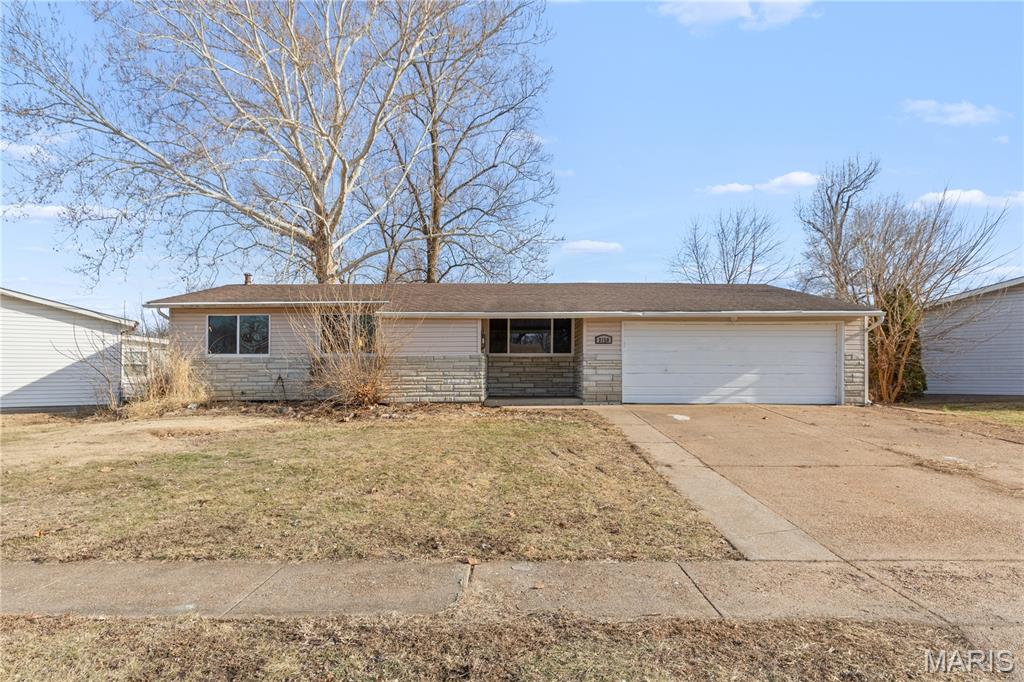 GREAT HOUSE! HUGE YARD! COVERED PATIO! SUNROOM! What is not to love about this newly available property in Florissant? The property features a large 2 CAR GARAGE and LOTS of outdoor living space! Walk into your mudroom as you enter the front door that leads into the large living room, that flows into the dining room and large kitchen. The kitchen leads into the laundry room/additional mudroom from the garage and also has exterior access. Walk into your HUGE SUNROOM off the back of the home that leads right out into the covered patio and fenced in backyard. The main level features 2 bedrooms and one primary suite with a half bath and WALK IN CLOSET! The unfinished basement leaves lot of room for storage, additional living space OR finishing it to add A TON of square-footage to this already large home. The systems are all in great shape and there is a sump pump already installed in the basement. Enjoy your tankless water heater for unlimited hot water and the newer furnace and AC. THIS WONT LAST LONG, SCHEDULE YOUR SHOWINGS TODAY!!!