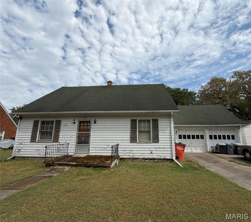 This 3-bedroom, 2-bathroom home is full of character, space, and potential! Beautiful hardwood floors flow throughout much of the home, while large windows provide plenty of natural light and create a warm, inviting atmosphere.

The eat-in kitchen features a good-sized pantry and plenty of retro charm. Love the vintage look? Embrace it as-is! Dreaming of something more modern? With a little updating, this space could easily be transformed into the kitchen you’ve been envisioning. On the opposite end of the spacious living room, there is also room to create a separate dining area.

You’ll appreciate the generously sized rooms throughout the home, along with the convenience of a bathroom on both the main and upper levels. A full basement provides plenty of additional storage and possibilities, while the attached 2-car garage adds even more convenience.

Whether you’re looking for a home to make your own or an investment property with great potential, this one has so much to offer. Bring your ideas and imagine the possibilities! Call your Realtor and schedule your showing!

Home is being sold as is.