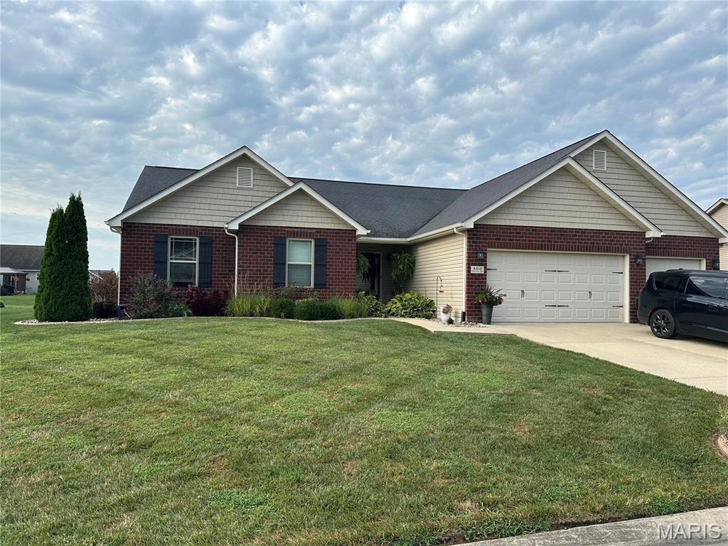 Beautifully maintained 3BR/2BA ranch in desirable Ledgestone Estates! Built in 2016, this move-in ready home is 1,568 sq ft of comfortable single-level living with an open, functional floor plan designed for both everyday living and entertaining. Situated on a spacious lot, the home features a fenced backyard and an impressive 700 sq ft concrete patio, creating the perfect outdoor space for relaxing or hosting guests. Concrete landscape edging adds a polished touch to the exterior, while the HVAC-equipped garage provides year-round comfort and flexibility for storage, hobbies, or workspace.  Bask in long showers with virtually unlimited hot water from the tankless water heater that was installed in May of 2025. Located in Smithton with convenient access to schools, shopping, and commuter routes, this home provides the ideal blend of style, comfort, and convenience.