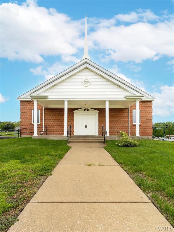Rare opportunity, A operating up to date church with a parsonage on the corner of Midland and Link. The church is full brick  approximately 8,000 sq. ft. on the main level with a full basement. Evaluator to access the lower level which features 10 partioned classroom areas, a nursery, two restrooms and a full kitchen. Inside the church there are 36 pews, a baptismal, pastors office, library, and a balcony with the sound system.  Asphalt parking lot with 65 parking spaces, Separate 1430 sq. ft 3 bedroom 2 bath ranch home with a 2 car garage. Location: Corner Location, High Traffic, Other