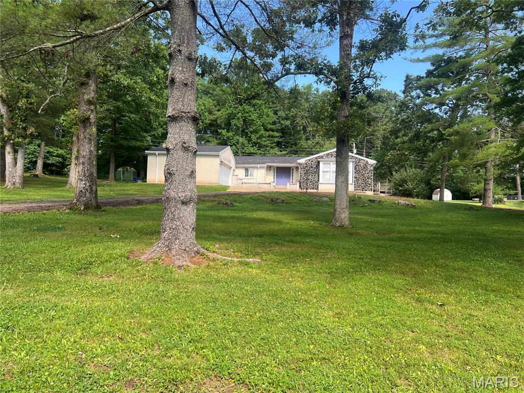 Located at 197 Wayne 340, Piedmont, MO 63957,  this single-family residence, promises a unique opportunity to create your ideal living space. HVAC installed in 2022, new roof in 2023, mini split in basement installed March 2025, new guttering and downspouts installed  in November 2024, new natural gas water heater and new washer and gas dryer. The interior has new drywall and fresh paint, luxury vinyl plank flooring installed March 2026, premium foam moisture resistant underlayment installed in kitchen and bathrooms, all new pine baseboard molding & trim, new toilets, new pressure tank and water filter system. The basement is plumbed for bathroom and could have additional bedroom and living area.  Waterproofing system installed in the basement with hydraway drain system, hydrashield wall coverings, and 2 sump pumps installed by Helitech, warranty is transferable.  The kitchen is left unfinished and wall covering is needed in the bathrooms. This property holds the potential for a wonderful home. Imagine the possibilities within this residence, ready to be shaped to your vision. This is an address where you can make lasting memories.