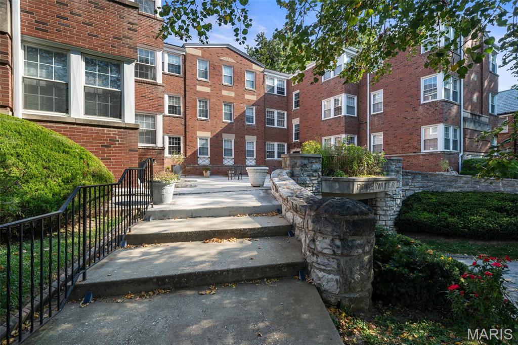 Architectural charm and timeless character define this stylish, updated condo in the heart of Clayton’s sought-after Moorlands neighborhood. Freshly painted and filled with natural light, this 2-bedroom, 1-bath residence features beautiful hardwood floors throughout and an updated kitchen that blends modern convenience with the home’s classic appeal. Generous storage throughout provides a rare level of functionality, while assigned parking adds everyday convenience. A one year old roof and 4 year old HVAC offer added peace of mind. In-unit laundry and extra storage arrangements in the basement make this unit move-in-ready. Ideally located just minutes from Clayton’s restaurants, shops, parks, and business district, 7563 Oxford Drive offers the perfect combination of historic charm, thoughtful updates, and an unbeatable location.