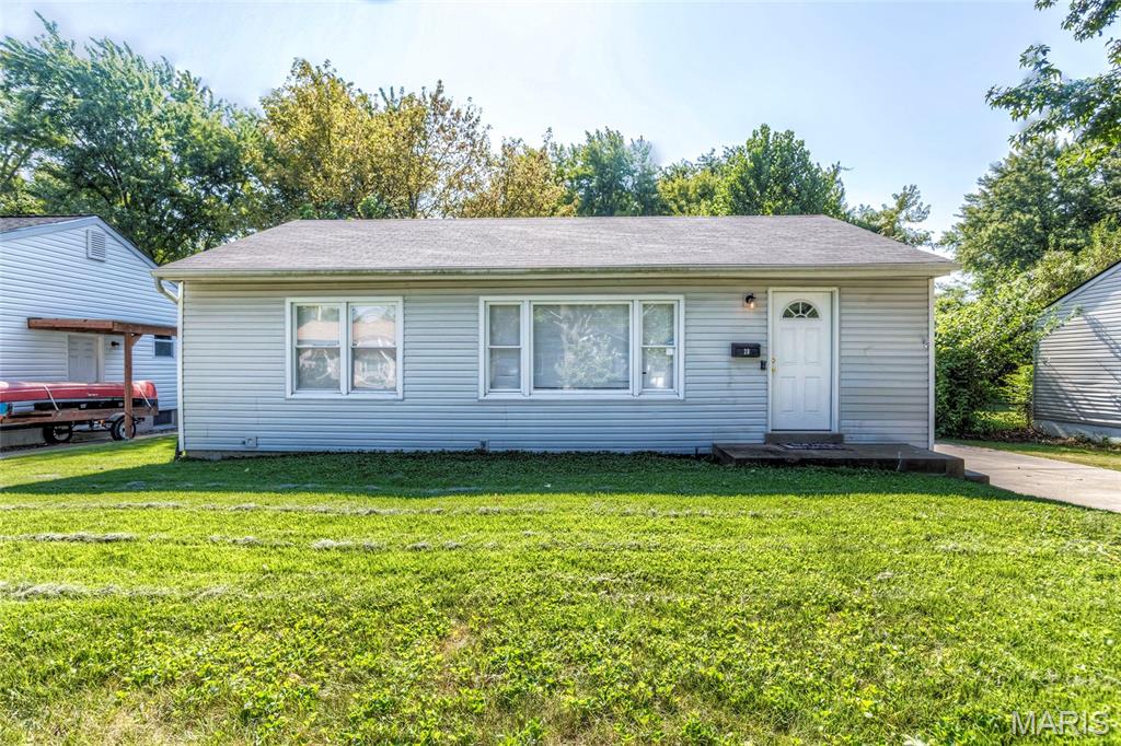 Welcome to 20 La Venta Drive in Florissant!  Looking for a 3BR home for yourself or to add to your rental portfolio?  Here it is!  This updated home is move-in ready.  Kitchen features beautiful white shaker cabinetry with designer pulls, stainless steel refrigerator stays, smoothtop stainless steel range and built-in SS microwave, newer SS dishwasher, ceramic tile flooring, subway tile backsplash and upgraded kitchen faucet.  Big Family Room/Dining Room combo w/coat closet and pretty ceiling fan.  All three bedrooms have luxury vinyl plank flooring, 4" baseboards, stylish ceiling fans.  Six-panel doors throughout.  Pretty bathroom with large format subway tile in shower.  Newer windows.  Fenced backyard.  All appliances stay (washer, dryer, refrigerator, plus the built-ins).  Very convenient to Florissant's restaurants and bars & grills (Old Town and otherwise!), Dierbergs, etc., plus fast highway access.  See this one today!