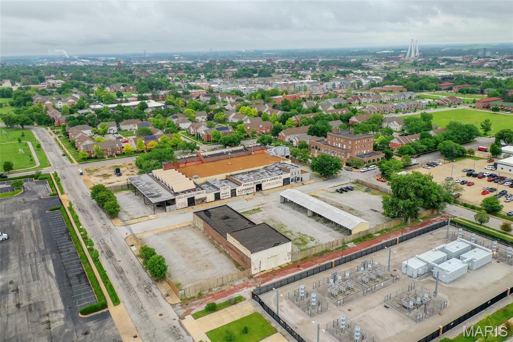 Unique opportunity to acquire a 3.10 acre, fully-fenced site consisting of 2 full city blocks immediately North of Downtown St. Louis.
The property, formerly occupied by a lumber yard, consists of 2 building structures. Building 1 is the main building and 35,525 S.F. with 6 drive-ins (1 oversized), 24' tall ceilings and 2,150 S.F. of office space. Building 2 is 7,650 S.F. with 2 drive-ins. There is also a covered outside storage area on site.
The properties are zoned J and originally constructed between 1890-1898.
Potential uses for the property include contractor storage yard or warehousing/distribution uses. Property is served by 3-phase, 1600 amp electric service and is fully-sprinklered.
Convenient access to Downtown St. Louis and Veterans Memorial Bridge (I-70, I-55 and I-64 access). Location: City, Downtown