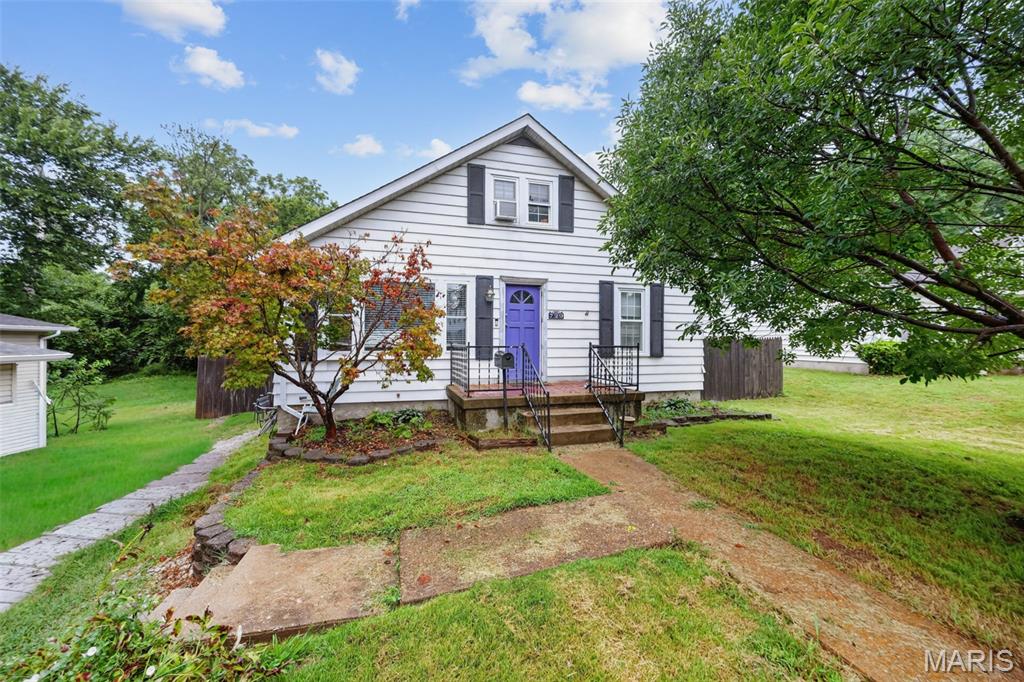 This charming dollhouse is located right in town. From the moment you turn the key you will see that classic charm with the home. This home features the natural hardwood flooring that greets you in the living room, curl up on the cold nights with the fireplace that enhances the living room.  The main level features two spacious bedrooms and the large eat in kitchen. The upper level has a loft that is perfect for that work from home office. The primary suite sits right off the loft creating that private space. The lower level is finished with a rec area, second full bathroom, a laundry room, and the bonus sleeping room, playroom, or second office. The level lot is fenced in offering peace of mind.  New carpeting in the basement and the hot water heater is newer. The home is complete with all appliances in the kitchen to remain.  You won't want to miss this one.