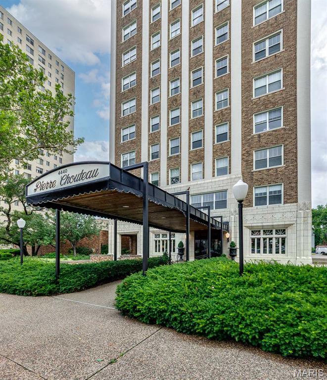 Experience refined city living in this charming 5th-floor corner residence at the iconic Pierre Chouteau Building, one of the Central West End’s most prestigious addresses. Showcasing gorgeous Parisian-inspired architecture and sweeping views of the Cathedral Basilica of Saint Louis and the city skyline, this spacious condo offers 3 bedrooms, 2 full baths and approximately 1,400 square feet of beautifully preserved living space. Timeless character abounds with original hardwood floors, elegant cove moldings, picture rails, arched openings, and original millwork throughout. A gracious foyer welcomes you into the light-filled interior, featuring an expansive living room and formal dining room with abundant built-in shelving. The floor plan includes a desirable primary suite with generous closet space, along with a versatile third bedroom ideal for guests or a home office with access to a full bath, in-unit laundry, and separate entrance.
This residence presents a rare opportunity to customize and add value in one of St. Louis' most sought-after buildings and includes 1 space parking space in the heated garage.
Residents enjoy exceptional full-service amenities, including 24-hour doorman and security service, rooftop deck access, extra storage, and major utilities such as heat, cable, and more included in the monthly fee. Located in the heart of the Central West End, just minutes, or steps! from Barnes-Jewish Hospital, acclaimed dining and shopping, and the world-class amenities of Forest Park, this is a rare chance to create a showplace residence while enjoying the charm, character, and prestige of the Pierre Chouteau.