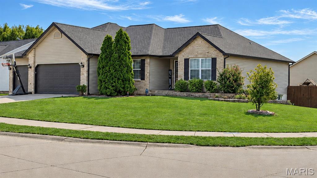 Welcome to 6700 Crossington Lane; a thoughtfully improved and well-maintained, spacious ranch situated on a prominent corner lot in the Remington Place subdivision. This home features approximately 2,500 square feet of finished living area with an oversized three-car attached garage on an expansive level lot.

The main level offers 1,775 square feet with an open, split-bedroom floor plan, vaulted living room ceilings, dual gas and wood-burning fireplace, hardwood flooring, formal dining area, breakfast nook, and convenient main-floor laundry. The updated kitchen features granite countertops, stainless-steel appliances, and plenty of cabinetry. Step inside the spacious primary bedroom to find an ensuite bath with dual vanities, a jetted tub, and walk-in closet. Two additional bedrooms and a full hall bath round out the first floor. The partially-finished lower level includes an extensive family room, sizeable fourth bedroom with a large egress window, and a half bathroom. There is also ample unfinished space, providing additional storage and endless potential. Outside, the privacy-fenced yard reflects years of thoughtful care, with established trees, purposeful landscaping, and lush Kentucky bluegrass. Not to mention the backyard playground set; perfect for the young - or the young at heart.

Major improvements include the roof, gutters, downspouts, and fascia all replaced in 2025; refrigerator, dishwasher, and range in 2024; 50-gallon water heater in 2022; privacy fence in 2020; and HVAC system and AC condenser in 2019. Additional features include a whole-house water filtration system, a perimeter drain with pop-up emitters, sump-pump with battery backup, professionally cleaned air ducts, high-speed fiber internet, Nest thermostat and doorbell, Wi-Fi-enabled garage door openers with myQ connectivity, a portable-generator hookup with interlock kit, and a natural-gas line installed in the back of the home for the capabilities of providing a continuous fuel source.

Enjoy a tucked-away neighborhood setting with easy access to major highways, Anderson Hospital, and Madison County trails, as well as local shopping and dining. This meticulously cared-for home allows for effortless enjoyment of the conveniences of today with thoughtful consideration for the uncertainties of tomorrow. Don't miss the opportunity to make it your own.