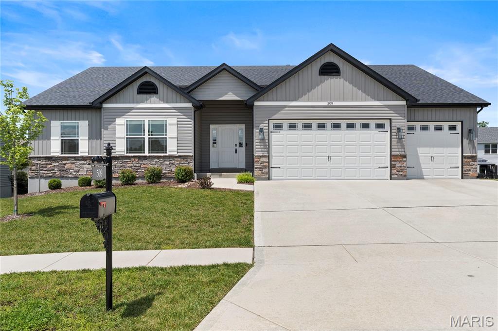 Welcome home to this stunning, move-in ready gem that truly has it all! A grand entry leads to an impressive great room featuring upgraded flooring, soaring 12-foot ceilings, a wall of windows with transoms above, and abundant natural light, while 9-foot ceilings enhance the rest of the home. The dream kitchen boasts 42-inch upgraded white cabinetry, a massive white oak center island, a large walk-in pantry, and stainless steel appliances. Dining room/breakfast has a beautiful custom built butler pantry with beverage fridge. Main level has 3 large bedrooms including luxury primary with coffered ceiling and luxury bath with double vanities. The beautifully finished walkout lower level features a family room, recreation area, 4th bedroom and bathroom and a custom built vanity/closet dressing room. Situated on a large culdesac lot, this home offers luxurious upgrades throughout, including a fully sodded and landscaped yard, iron mailbox, fenced backyard perfect for kids or pets, a large maintenance-free deck, and an expansive patio for outdoor entertaining. Don't miss the oversized 4 CAR GARAGE, the third bay is two car tandum!! Why wait to build when your dream home is already complete and ready now? Fast closing available!