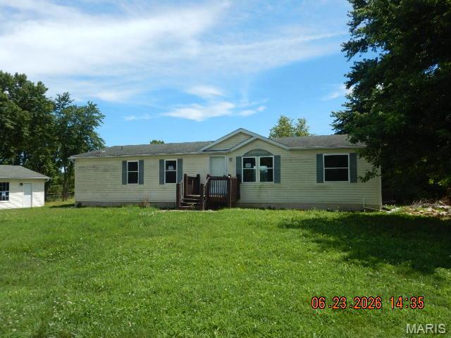 Ranch style manufactured home with three bedrooms, two bathrooms on .75 acre. Large, level lot with a covered patio off the back. The house is no all full basement. Detached two car garage with additional off street parking. Easy to show, make your appointment today!
