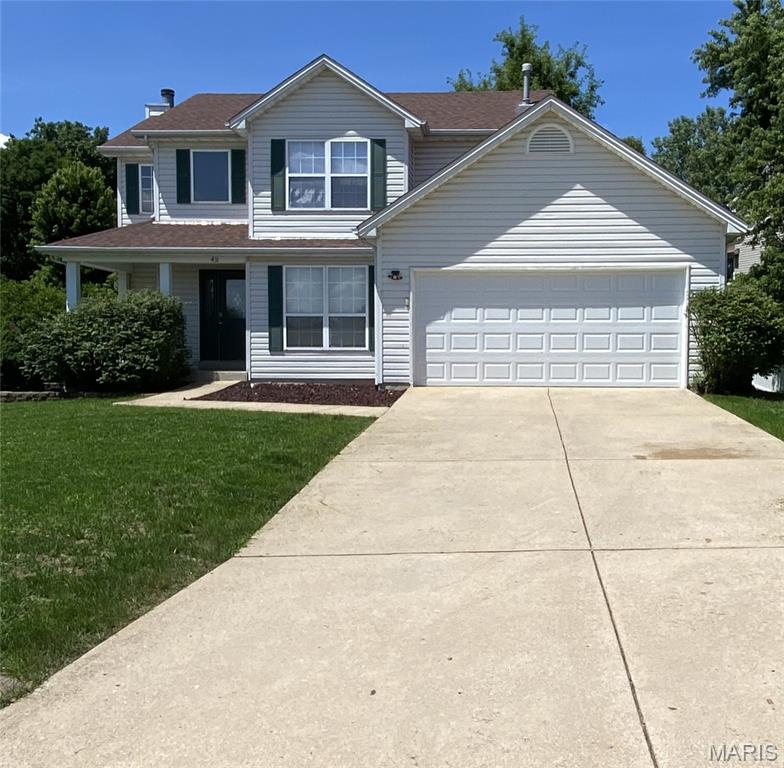 Discover a home that truly embraces the charm of community living. Nestled in a highly desirable neighborhood known for its friendly atmosphere, this property offers a lifestyle that balances comfort, convenience, and everyday enjoyment.

Inside, the home features a warm and inviting layout enhanced by a series of thoughtful updates. The main floor now showcases new Oak hardwood floors.  The kitchen has been fully updated with new white cabinets with soft close drawers and doors.   The new owner can choose their preferred hardware, which the seller will provide.   The countertop and back splash are a beautiful matching brand new quartz.   Finishing out the kitchen is brand new GE stainless steel kitchen appliances, which include a refrigerator, electric stove, above the range microwave, dishwasher, and disposal.   There is also an included clothes washer and gas dryer in the main floor laundry room located just off the kitchen.  The main floor powder room has been completely updated as well.   The second floor hall bath and primary bath include new ceramic tile.  The hall bathroom has also been completely updated.  The home also offers new carpet throughout the stairs and second floor.   There is also a new garage door installed in the garage with an electric opener.  The backyard features a deck off the walkout kitchen sliding door that steps down to a nice concrete patio.

The location is a standout feature, offering exceptional convenience. Schools, a bank, hardware store, automotive store, grocery store, dollar store, multiple food options, and a gas station are all within walking distance, making daily errands and essentials incredibly easy to access while still enjoying the quiet, residential feel of the area.

Get your offer in today.  Let's make this your new home.
