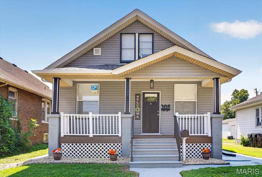 Welcome to 1406 Raab Avenue, a thoughtfully renovated 4-bedroom, 2-bathroom home offering approximately 1,800 square feet of living space. An inviting covered front porch provides the perfect place to enjoy your morning coffee before stepping inside to find new flooring, updated walls and ceilings, fresh paint, and new stainless steel appliances. Both bathrooms feature attractive modern finishes, while the spacious layout provides plenty of flexibility for everyday living.

The full unfinished basement offers ample storage and workshop space, along with endless possibilities for future use. Create a game room, home theater, workout area, hobby space, or whatever fits your needs. Virtually staged basement photos help showcase its potential. Additional improvements include energy-efficient front windows installed in 2025, a new sump pump, and completed work intended to help keep the basement dry.

Outside, the privacy-fenced backyard offers plenty of room for relaxing and entertaining. A seller-provided one-year home warranty adds even more peace of mind. Conveniently located near Downtown Belleville, local restaurants, shopping, parks, and community events, this updated home is ready for its next owner!