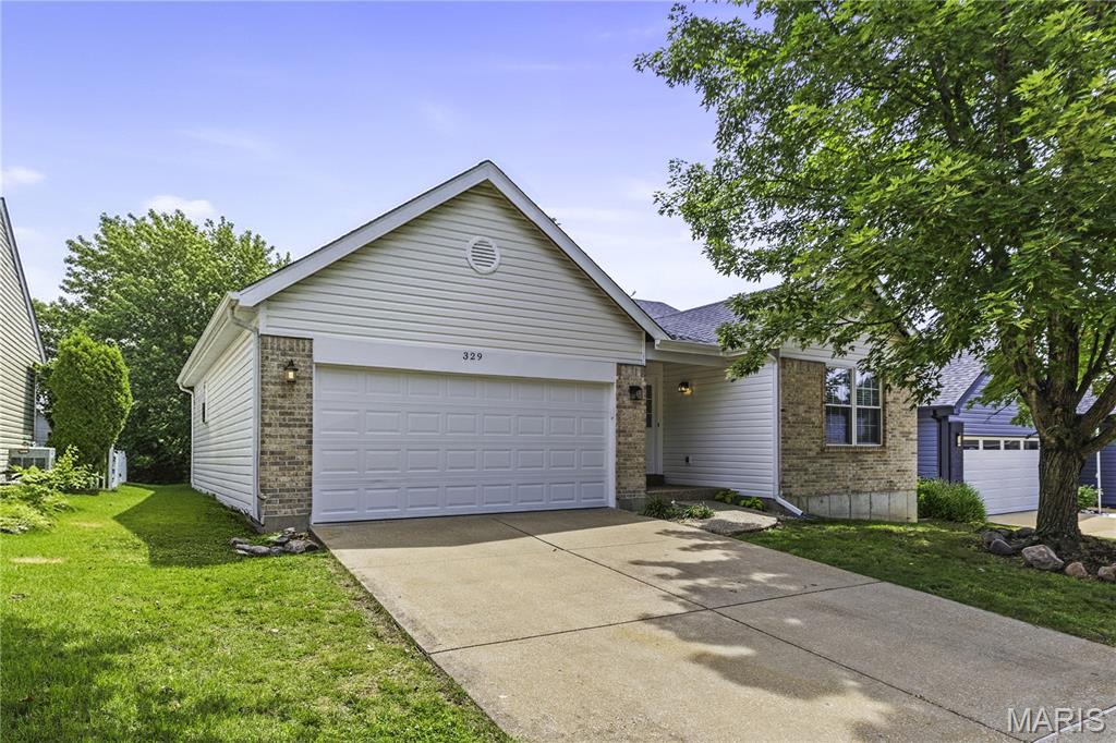 This impeccably maintained 3 bedroom, 2 bathroom ranch offers complete peace of mind with an impressive list of recent upgrades, including a brand-new roof, gutters, siding, and garage door, alongside a newer HVAC system and water heater. Inside, the airy open concept layout is highlighted by dramatic vaulted ceilings, making it an ideal space for entertaining guests. The modernized kitchen boasts custom cabinetry and a gas range, while the inviting living area features durable luxury vinyl flooring and updated windows and sliding glass doors that flood the space with natural light. Complete with a spacious primary suite featuring a private full bath and walk-in closet, this turn-key, worry-free gem is entirely move-in ready and waiting for its next owner— schedule your private tour today before it's gone!