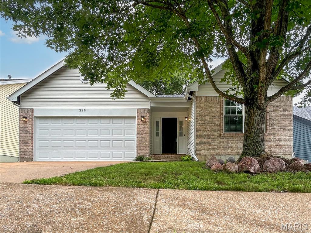 This impeccably maintained 3 bedroom, 2 bathroom ranch offers complete peace of mind with an impressive list of recent upgrades, including a brand-new roof, gutters, siding, and garage door, alongside a newer HVAC system and water heater. Inside, the airy open concept layout is highlighted by dramatic vaulted ceilings, making it an ideal space for entertaining guests. The modernized kitchen boasts custom cabinetry and a gas range, while the inviting living area features durable luxury vinyl flooring and updated windows and sliding glass doors that flood the space with natural light. Complete with a spacious primary suite featuring a private full bath and walk-in closet, this turn-key, worry-free gem is entirely move-in ready and waiting for its next owner— schedule your private tour today before it's gone!