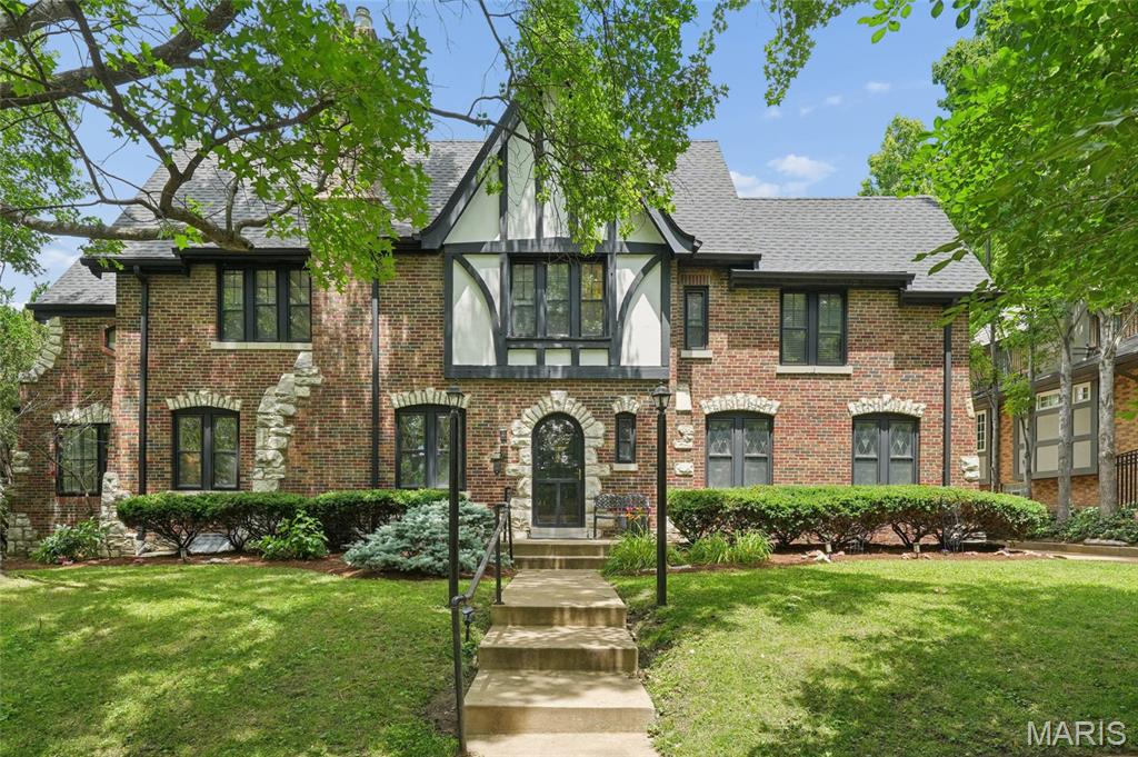 Welcome to this beautiful Moorlands home, where classic Clayton character, generous living spaces, and thoughtful updates come together in a truly special way. From the moment you enter, the home feels warm and inviting, with light-filled rooms, hardwood floors, leaded glass windows, French doors, and timeless architectural details that give it such charm and presence.

The main level offers a wonderful flow for both everyday living and entertaining, featuring a spacious living room, elegant dining room, comfortable office/den, and an updated kitchen with quartz countertops, stainless steel appliances, abundant cabinetry, and a bright eat-in area. French doors from the dining room open to the backyard, creating a lovely connection to outdoor space for relaxing, hosting, or enjoying quiet evenings at home.

Upstairs, you will find four generous bedrooms and three full bathrooms, offering rare space and flexibility in one of Clayton’s most loved neighborhoods. The primary bathroom adds a spa-like touch with marble flooring, a heated-floor system for added comfort, and a washer/dryer hookup for added convenience. The finished third-level attic provides even more usable space and can be enjoyed as a private office, creative studio, playroom, or kids’ entertainment area, complete with a convenient half bathroom.

The finished lower level adds another layer of versatility with a family/recreation room, kitchenette, and full bathroom — ideal for guests, extended stays, movie nights, entertaining, or a comfortable second living area.

Located in the heart of the sought-after Moorlands, this home offers the best of Clayton living: classic architecture, impressive space, thoughtful improvements, and a wonderful location close to parks, schools, restaurants, shops, and everything that makes this neighborhood so desirable.