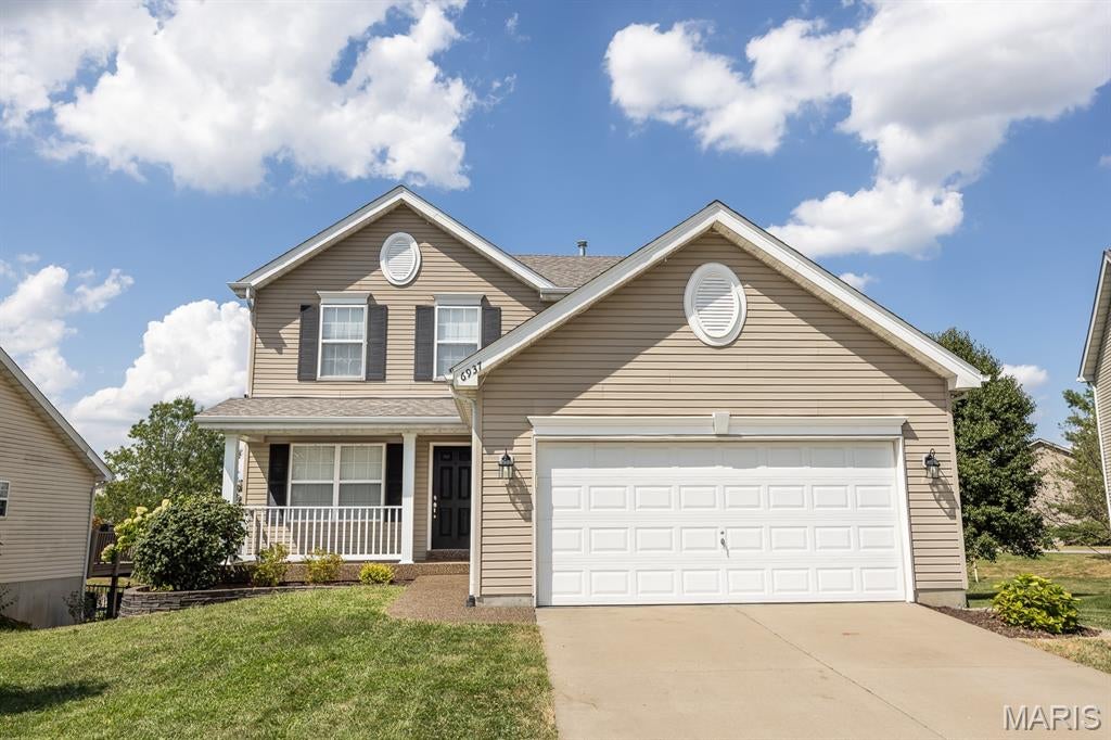 Welcome to Fountain Place! This 4-bedroom, 3.5-bath two-story home offers an inviting open layout with beautiful wood flooring throughout the main level. The kitchen features ample cabinetry, stainless steel appliances, and a large center island overlooking the spacious living and dining areas. The finished lower level provides additional living space and a fourth bedroom with a full bath. Step outside to the expansive deck and enjoy peaceful views of the lake. Located in the O’Fallon District 90 school district and conveniently located near shopping, dining, and major highways.