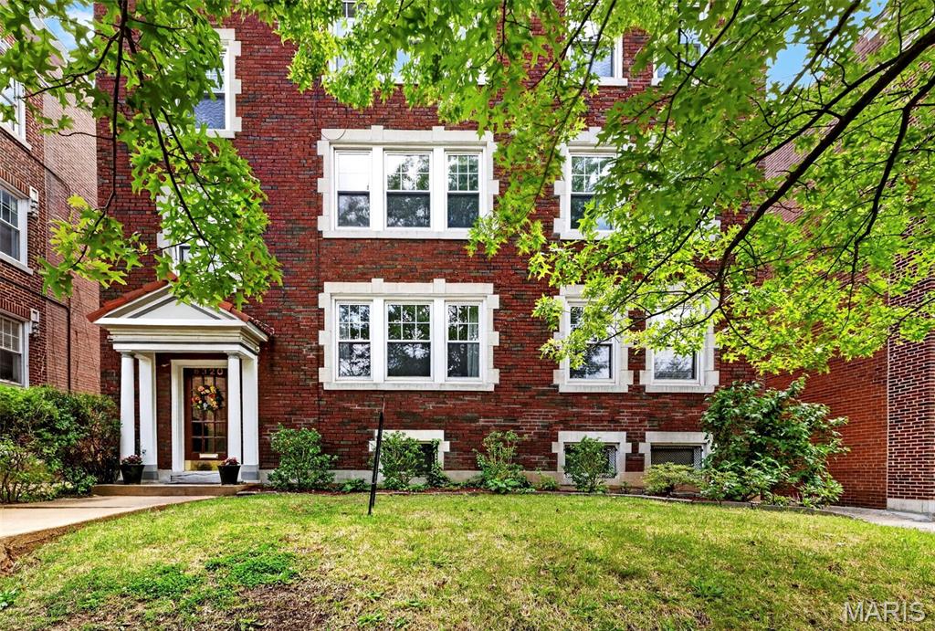 Welcome home to the award winning Clayton School District, where you can watch your child walk to Captain Elementary right from your living room window! This beautifully updated property combines comfort, efficiency, and flexible living space in an unbeatable location.

Major improvements completed within the past year include a brand-new TPO roof with 5” insulation underneath, R-38 attic insulation, new gutters and downspouts, new aluminum soffit and fascia, and new drywall in multiple areas throughout the home — all designed to keep utility costs down and comfort levels up year-round.

One of the first things you’ll notice are the gorgeous new wood floors flowing throughout the unit. The custom kitchen is both stylish and functional, featuring beautiful wood cabinetry, stone countertops, an undermount sink, stainless steel appliances, a Thermador refrigerator, induction stove and an under-counter washer/dryer (included and functioning, but sold as-is). The microwave is also an oven.  It can literally cook a whole turkey. Top of the line!

The spacious primary suite truly feels like a private retreat, complete with a soaking tub, separate glass-enclosed shower, double vanity and additional storage cabinetry. A  walk-in closet is the cherry on top. The adjoining sunroom makes the perfect office, reading nook, or sitting area.

The oversized second bedroom offers plenty of space, while the rare third bedroom and second full bath are tucked away separately, creating an ideal guest suite or private retreat. Prefer additional storage or prep space? The third bedroom could also serve as an incredible walk-in pantry or flex room.

The backyard has long been loved by all three owners and has tremendous potential to be restored to its former beauty. Photos from last year have been included to showcase the outdoor space prior to renovations.

Additional features include a one-car garage, abundant guest parking directly in front of the property, a large and clean basement with full-size washer and dryer hookups belonging to this unit, plus an enormous private storage room located just to the right of the electrical panels. The storage room is currently unlocked for viewing and will be emptied prior to closing.

HOA is $400/month and includes water, sewer, trash and common area electricity. The 2 year old Lennox HVAC is high efficiency so your bills will be low and your comfort high. Huge water heater in basement serves all 3 condos. This third floor unit housed 4 kiddos and 2 adults and they NEVER ran out of hot water!

Additionally, living in DeMun, is amazing. Enjoy many top rated restaurants, plus Kaldis, the Candy Store and Clementines Ice Cream, just steps from your home. Stroll through the park in the neighborhood or walk to Forest Park, St Louis' GEM, where you'll find the free Zoo, Art Museum, History Museum and so much more.