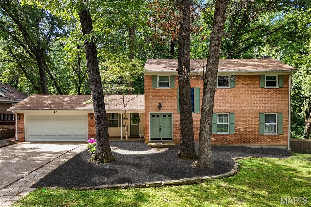 RARE opportunity to own over 1.12 ACRES featuring 4 bedrooms (one featuring an IN-LAW SUITE) and 4 bathrooms, with WALK-OUT basement in the heart of Belleville! Tucked away on a beautifully wooded, cul-de-sac FULLY fenced lot, this spacious home offers the privacy of a country setting while keeping you just minutes from shopping, dining, schools, and everything town has to offer. Inside, you'll find updates throughout, including LVP flooring, granite countertops, updated lighting, freshly finished walls and ceilings, energy efficient AC replaced in 2025, and a beautifully renovated kitchen with SS appliances and custom cabinetry. The main level features a spacious great room with a cozy fireplace, a bay-window dining room, and sliding glass doors leading to a deck overlooking the peaceful backyard. Upstairs, the primary suite offers a private bath with dual vanity, accompanied by two additional bedrooms, another FULL bathroom, and an impressive walk-in closet. The WALK-OUT lower level is where this home truly stands apart, featuring a complete IN-LAW SUITE with its own full kitchen, spacious family room, pantry, laundry area, FULL bathroom, and direct access to a stunning stone patio. Whether you're accommodating extended family, hosting long-term guests, or looking for flexible living space, this setup offers endless possibilities. Schedule your showing today!