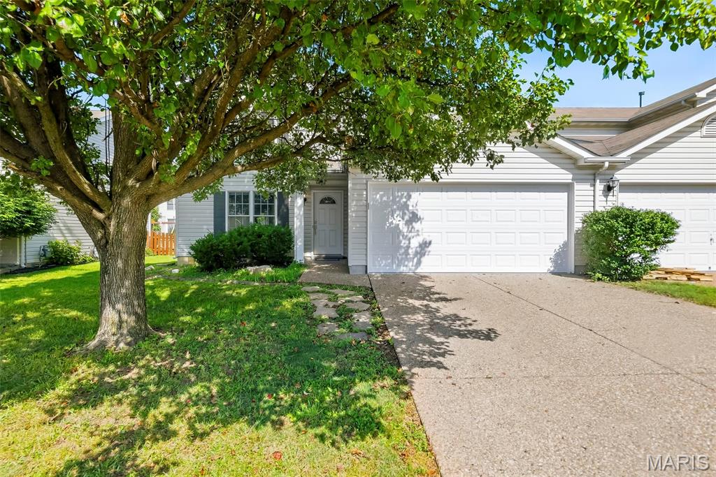 Welcome to easy villa living in the desirable Stone Meadows community! Tucked away on a quiet cul-de-sac, this well-maintained 3-bedroom, 2.5-bath home offers a comfortable layout, fresh neutral paint throughout, and spaces designed to fit the way you live. The main level features a spacious kitchen with electric range, dishwasher, refrigerator, and walk-in pantry, plus a bright breakfast room with bay window and convenient access to the patio and level backyard. The living room and adjacent flexible space feature easy-care wood laminate flooring, while the additional room offers endless possibilities as a home office, sitting room, formal dining area, or additional living space. A laundry room and powder room complete the main level. Upstairs, the spacious primary suite features an en-suite bath and dual closets, including a walk-in, while two additional bedrooms share a full hall bathroom. Outside, the backyard offers a wonderful extension of the living space, with a patio that’s perfect for morning coffee, evening dining, or relaxing outdoors, while the level yard provides plenty of room to enjoy the fresh air. A 12' x 11' storage shed provides convenient space for lawn equipment, hobbies, and seasonal items, and the 2-car attached garage adds everyday convenience.
Stone Meadows offers an impressive collection of amenities, including two pools—one with zero-entry access and a lazy river, plus a separate lap pool—two stocked lakes, scenic walking trails, soccer fields, a baseball diamond, and beautifully maintained common grounds. Located in the desirable Wentzville (Timberland) School District with easy access to I-70, Highway 40/61, and Highway 364, you'll be just minutes from Wentzville Parkway and The Shoppes at Hawk Ridge for shopping, dining, fitness, entertainment, and everyday conveniences. This is the kind of home that gives you great space, great amenities, and a location that makes everyday life easy.