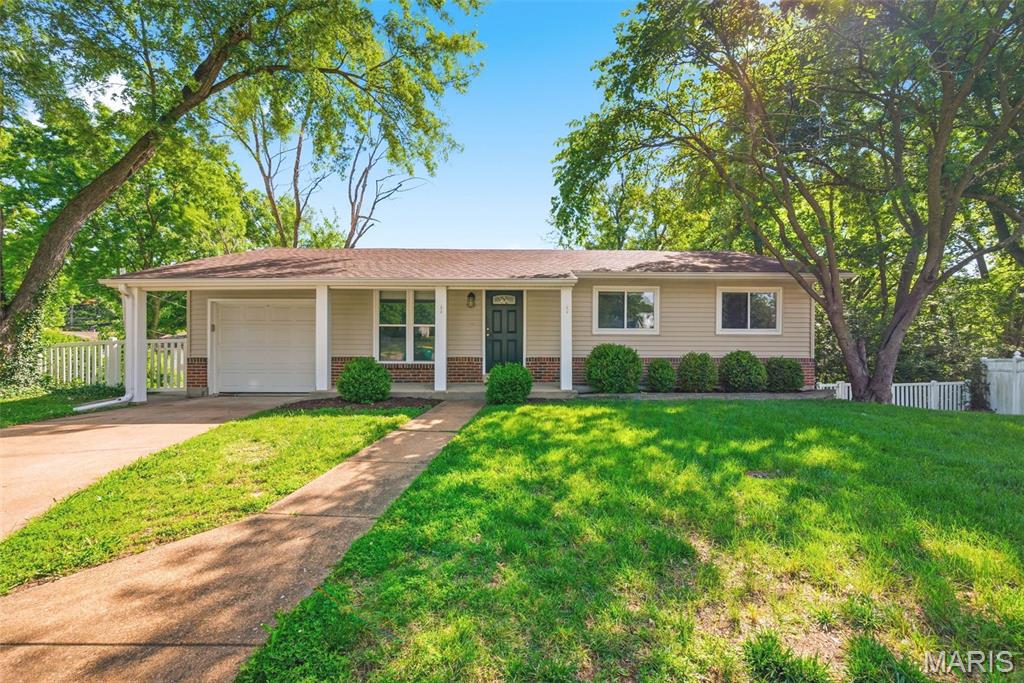 Beautifully updated 3 bedroom, 3 bath ranch located in the desirable Oakville area of unincorporated South St. Louis County! This move-in ready home offers a functional open floor plan, attractive finishes, and over 1900 square feet of combined living space between the main level and partially finished walk-out lower level.

Step inside to find warm hardwood flooring, spacious living areas, and an updated eat-in kitchen featuring white cabinetry, stainless steel appliances, and abundant counter space. The comfortable family room provides the perfect gathering place for everyday living and entertaining.

The primary suite includes a private bath, while two additional bedrooms and another full bath complete the main level. Downstairs, the partially finished walk-out lower level adds valuable living space with a large recreation room, full bath, utility area, and plenty of storage—ideal for a home office, workout area, media room, game room, or guest space.

Outside, enjoy the fenced backyard offering room for pets, play, gardening, and outdoor entertaining. The walk-out lower level provides easy access to the backyard and expands your options for enjoying the outdoor space.

Conveniently located near shopping, restaurants, parks, schools, and major highways, this well-maintained home combines comfort, space, and value in one outstanding package. Located within the Oakville High School attendance area, this is a home you'll want to see before it's gone!