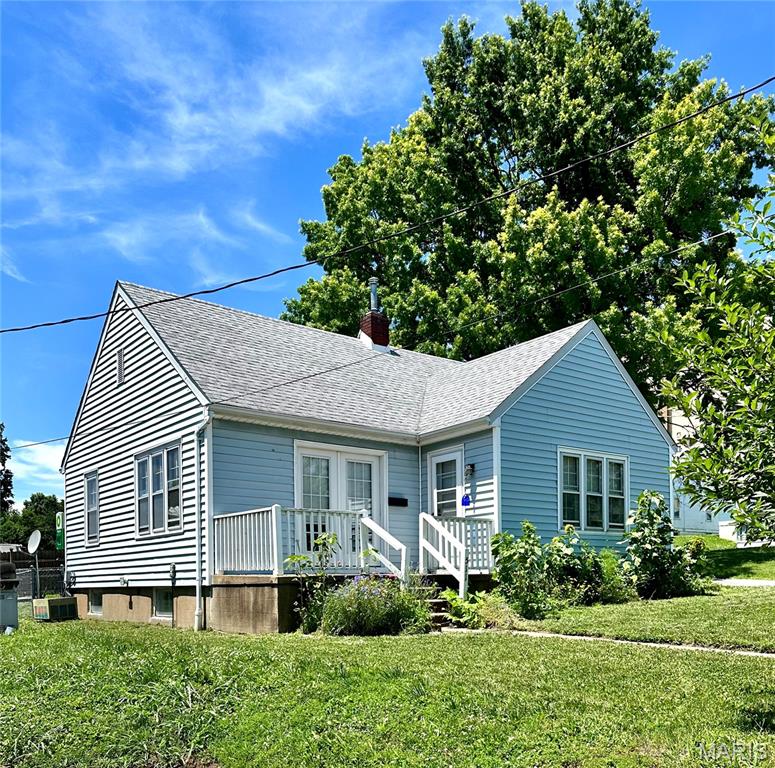 This adorable 2-bedroom, 1-bath home offers comfort, convenience, and character all in one package. Step inside through the French doors from the inviting front porch/deck into a spacious living room featuring beautiful wood floors. The cozy kitchen/dining combination and two generously sized bedrooms create a warm and welcoming feel throughout. 
Outside, you’ll love the level, fenced backyard—perfect for a swing set, pets, gardening or a BBQ. The full unfinished basement provides ample storage and includes a laundry area.  All appliances, including refrigerator, washer and dryer-that are less than a year old-are included in the sale.  Ideally located within walking distance of the hospital, doctors’ offices, parks, restaurants, shopping, and other everyday amenities, this home puts everything right at your fingertips.  Whether you’re looking for a starter home, downsizing, or seeking an investment opportunity, this property is full of potential and ready for your personal touch.