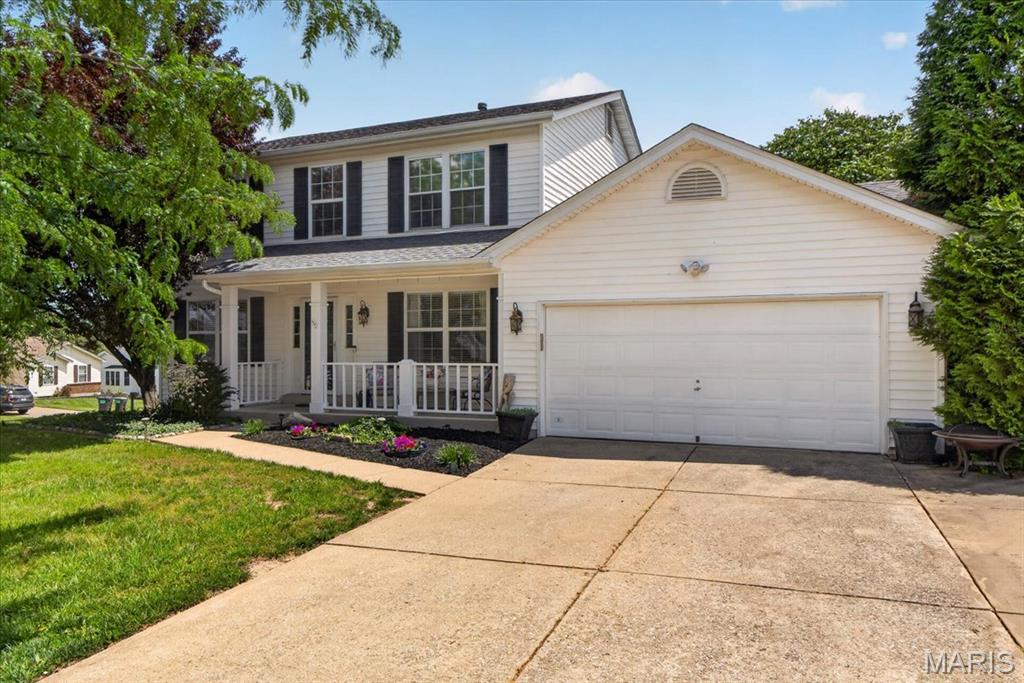 This beautifully maintained two-story home offers over 3,000 square feet of living space, featuring 4 bedrooms, 3.5 bathrooms, and a finished walk-out lower level designed for both everyday living and entertaining. Step inside to find a bright and inviting floor plan with spacious formal living and dining rooms, warm hardwood flooring, and abundant natural light throughout. The heart of the home is the updated kitchen, complete with granite countertops, center island, stainless steel appliances, ample cabinetry, and a sunny breakfast room that opens seamlessly to the expansive family room featuring a cozy wood-burning fireplace. Upstairs, the generous primary suite offers a private retreat with an ensuite bath, while three additional bedrooms provide plenty of space for family, guests, or a home office. The finished walk-out lower level expands your living options with a large recreation area, full bathroom, wet bar, and flexible spaces perfect for movie nights, game days, workouts, or working from home. Outdoor living is equally impressive with a spacious brand-new deck completed in 2026, overlooking the level, fenced backyard—ideal for summer gatherings, pets, and play. Conveniently located near shopping, dining, parks, and top-rated schools within the Francis Howell School District, this move-in-ready home offers the perfect blend of comfort, space, and location!
