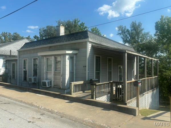 Multifamily building featuring two separate units. The upstairs is a spacious two-bedroom, one bathroom home. The downstairs unit is a large one-bedroom home that has fresh paint and flooring.
