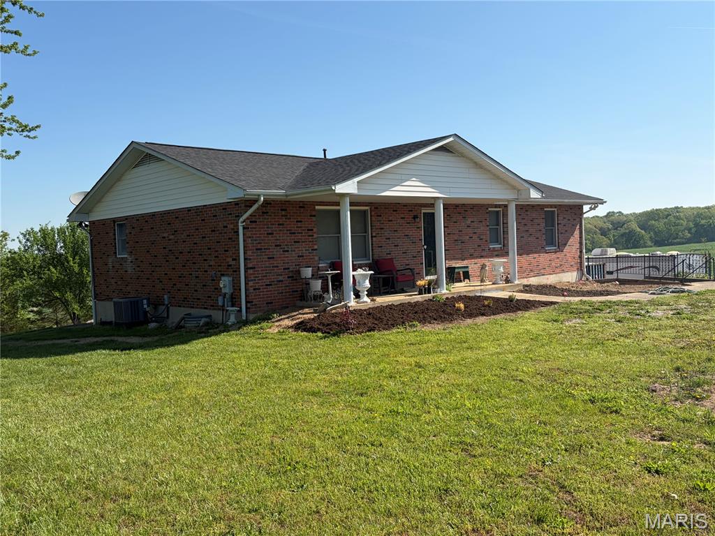 Nice brick home in the country!!  NO subdivision, NO restrictions!!  These are hard to find!!  3 bedroom, 3 bath ranch style home located on almost 2 acres.    Nice country kitchen with appliances included.  Good sized bedrooms and finished walk out basement with office space, bathroom and recreation room!  2 car rear entry tuck garage.  Country setting overlooks fields and woods with large composite deck for enjoying your morning coffee!!  Don't wait on this one!