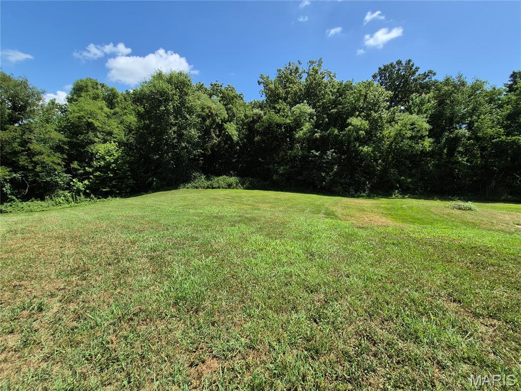 Build your dream home in one of Lincoln County's most prestigious subdivisions. Nestled at the end of a quiet cul-de-sac, this exceptional homesite offers a peaceful, private setting with mature trees creating a beautiful natural backdrop. At approximately 0.78+/- acres, the lot was expanded by combining it with half of an adjacent lot, providing additional space and flexibility for your custom home. Tax records will be updated to reflect the revised lot size. Enjoy the benefits of subdivision HOA protections and restrictive covenants, all while being just a short drive from shopping, dining, schools, and other everyday conveniences. This is a rare opportunity to own a premium homesite in an established luxury community.